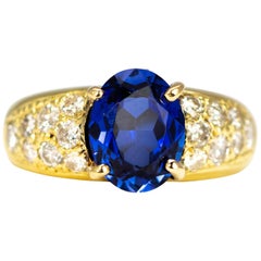 18 Karat Gold Ring mit Saphir und Diamant