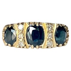 Anello d'epoca con tre pietre in oro 18 carati con zaffiro e diamante