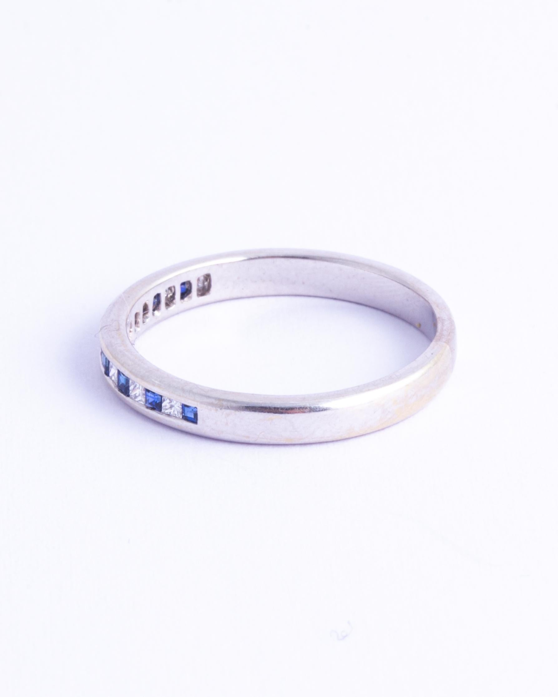 The gorgeous square cut stones set within the 18ct white gold are so sparkly and the sapphires are a great bright blue colour. The diamonds total approx 25pts and the sapphires total approx 25pts. Made in London, England. 

Ring Size: K 1/2 or 5 1/2