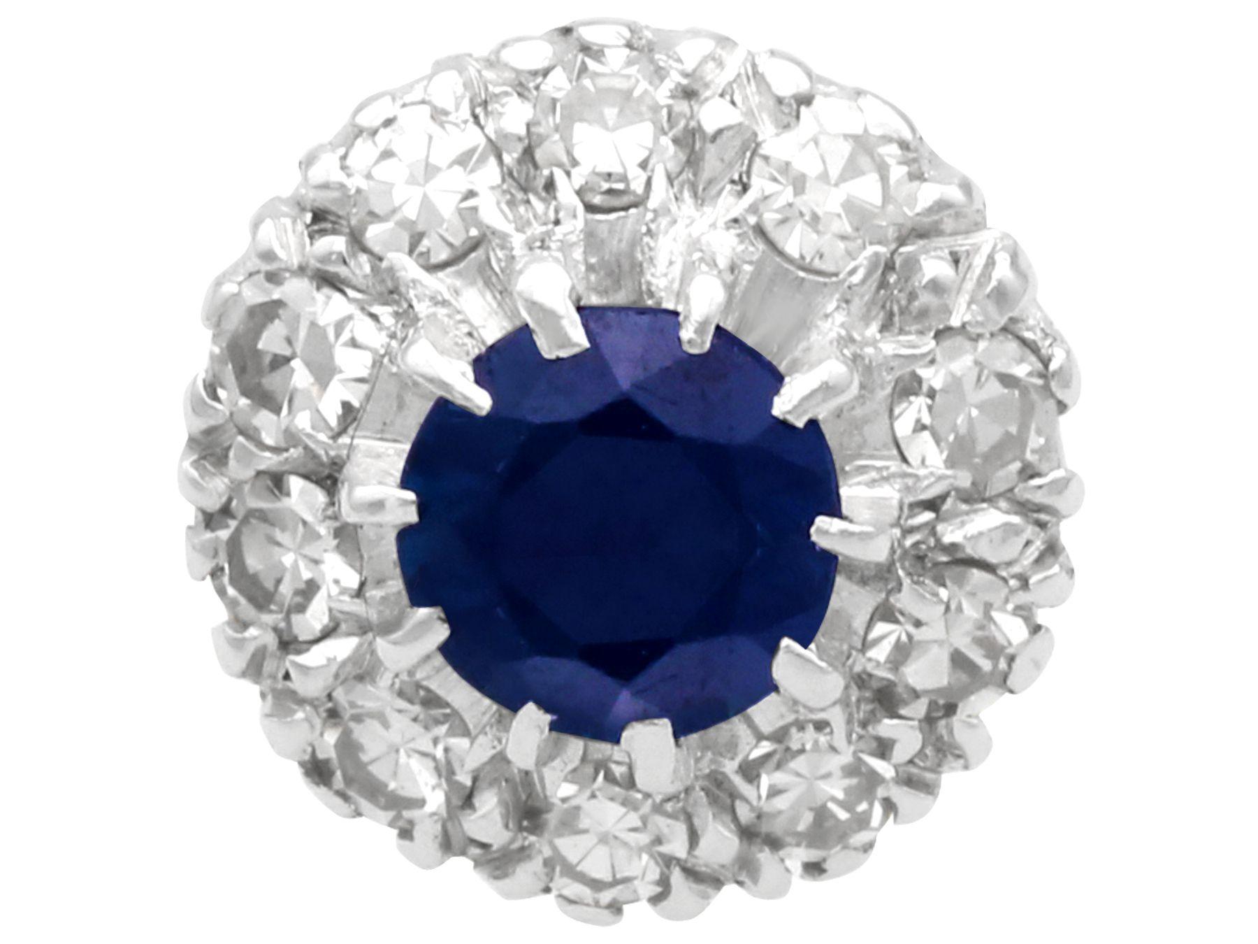 A fine and impressive 0.56 carat sapphire and 0.35 carat diamond, 18 carat white gold cluster earrings; part of our diverse gemstone jewellery collections.

These fine and impressive vintage sapphire earrings have been crafted in 18ct white