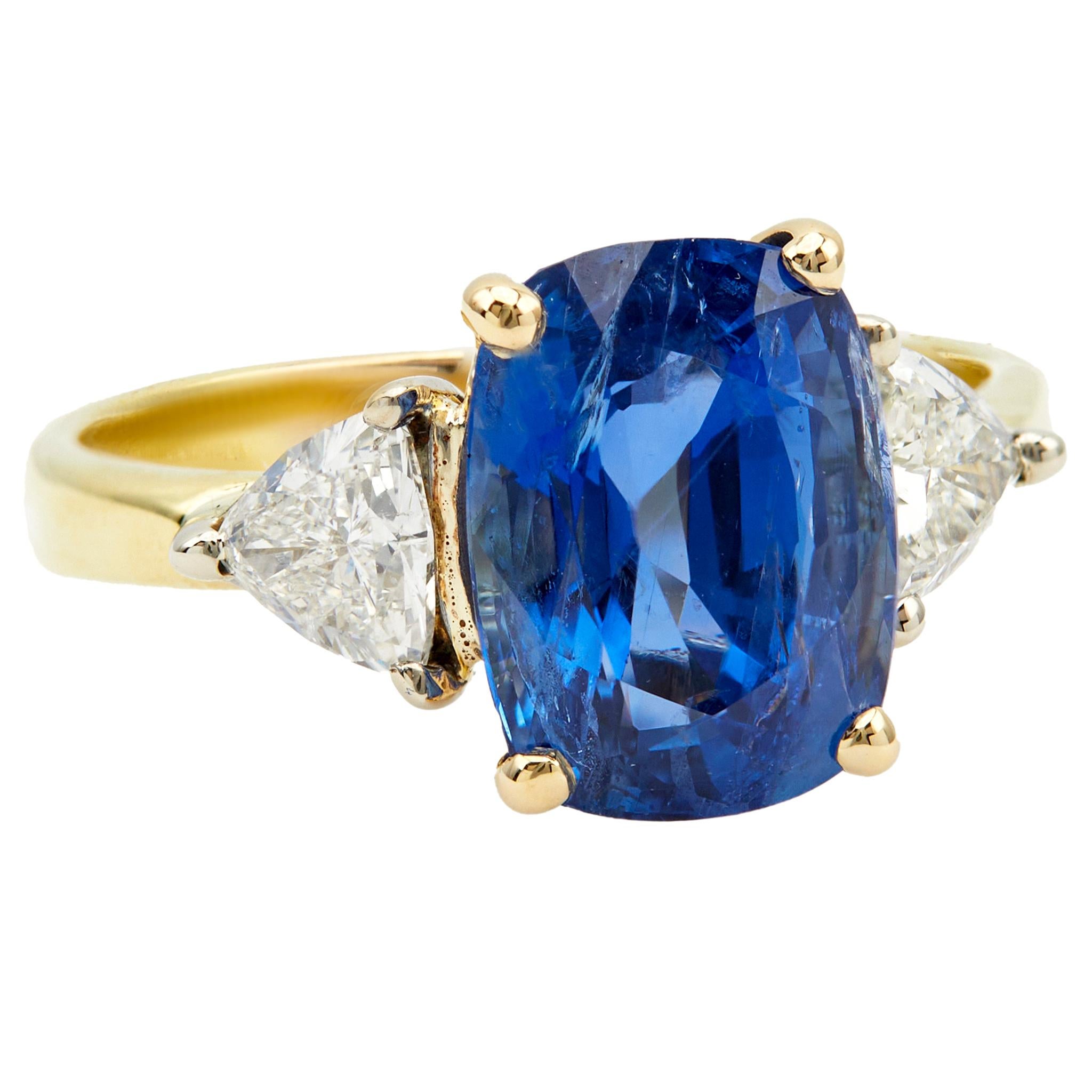 Femenino o masculino Anillo vintage de tres piedras de oro amarillo de 18k con zafiro y diamantes