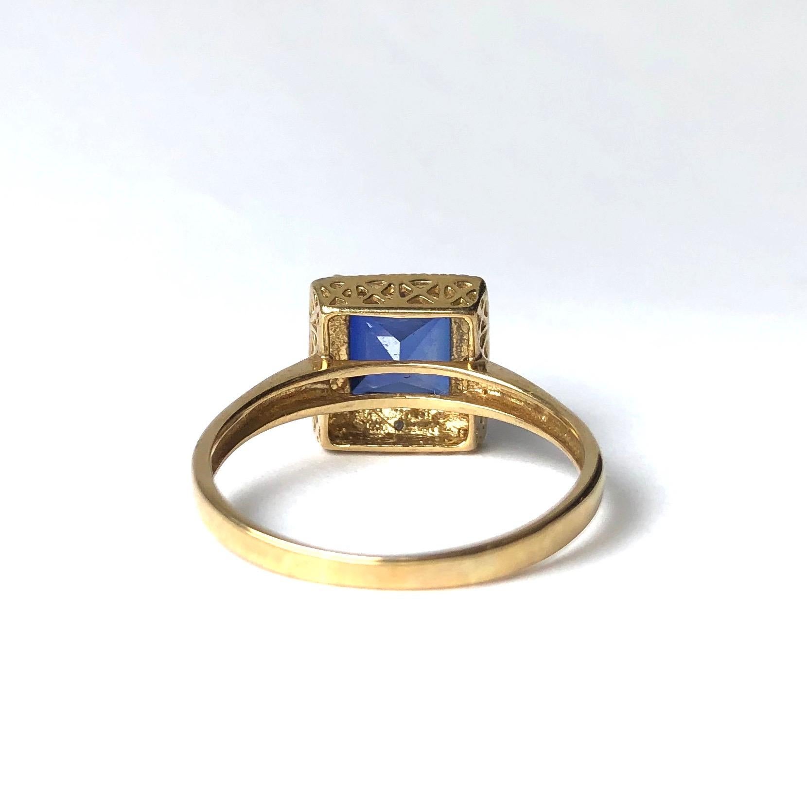 Modern Vintage Sapphire and Diamond 9 Carat Gold Solitaire Ring