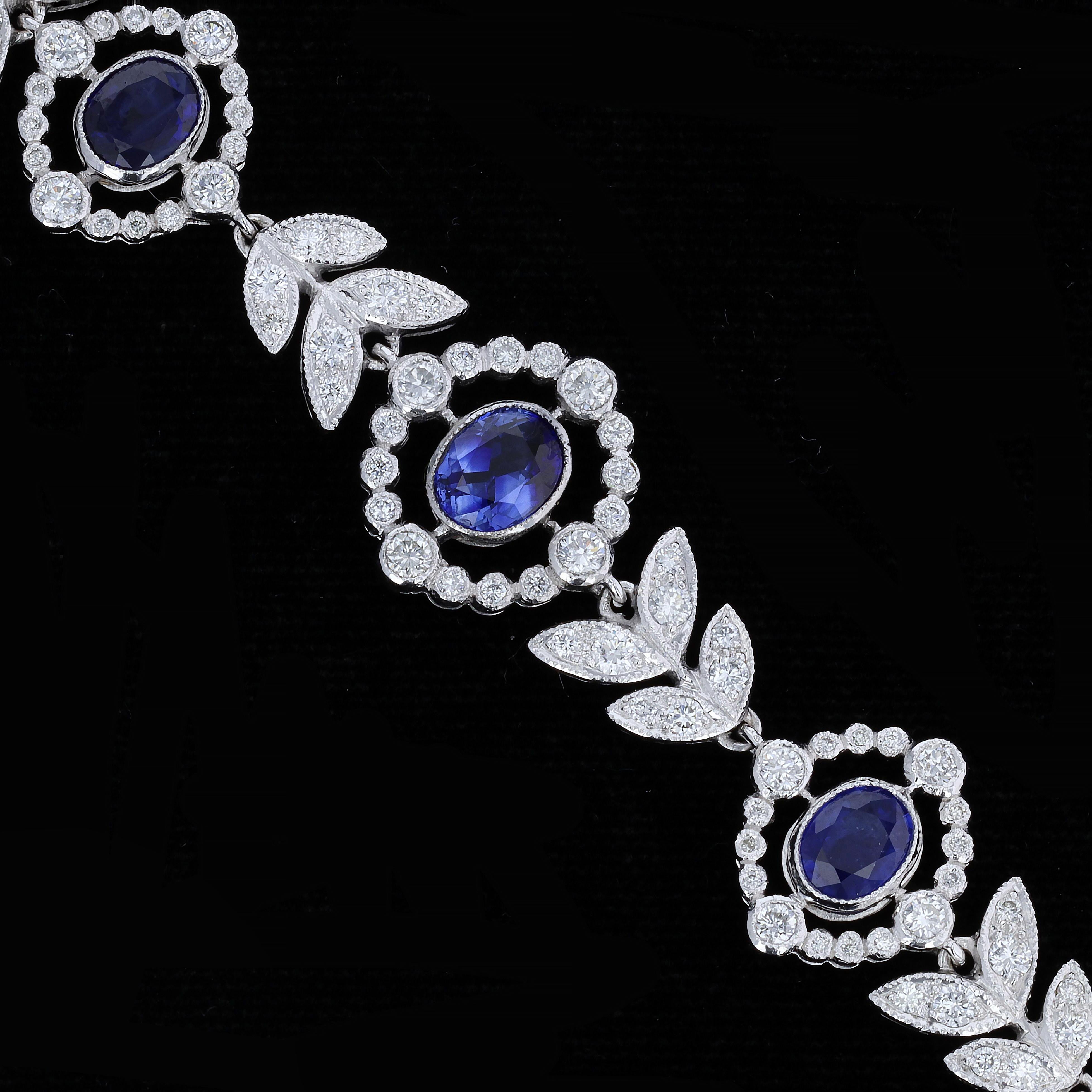 Captivate your heart and imagination with this vivid vintage sapphire and diamond bracelet. Nine oval cut 6.79 twt sapphires are accented with an array of round cut diamonds weighing 2.83 twt in this 18K white gold bracelet. The bracelet measures 7