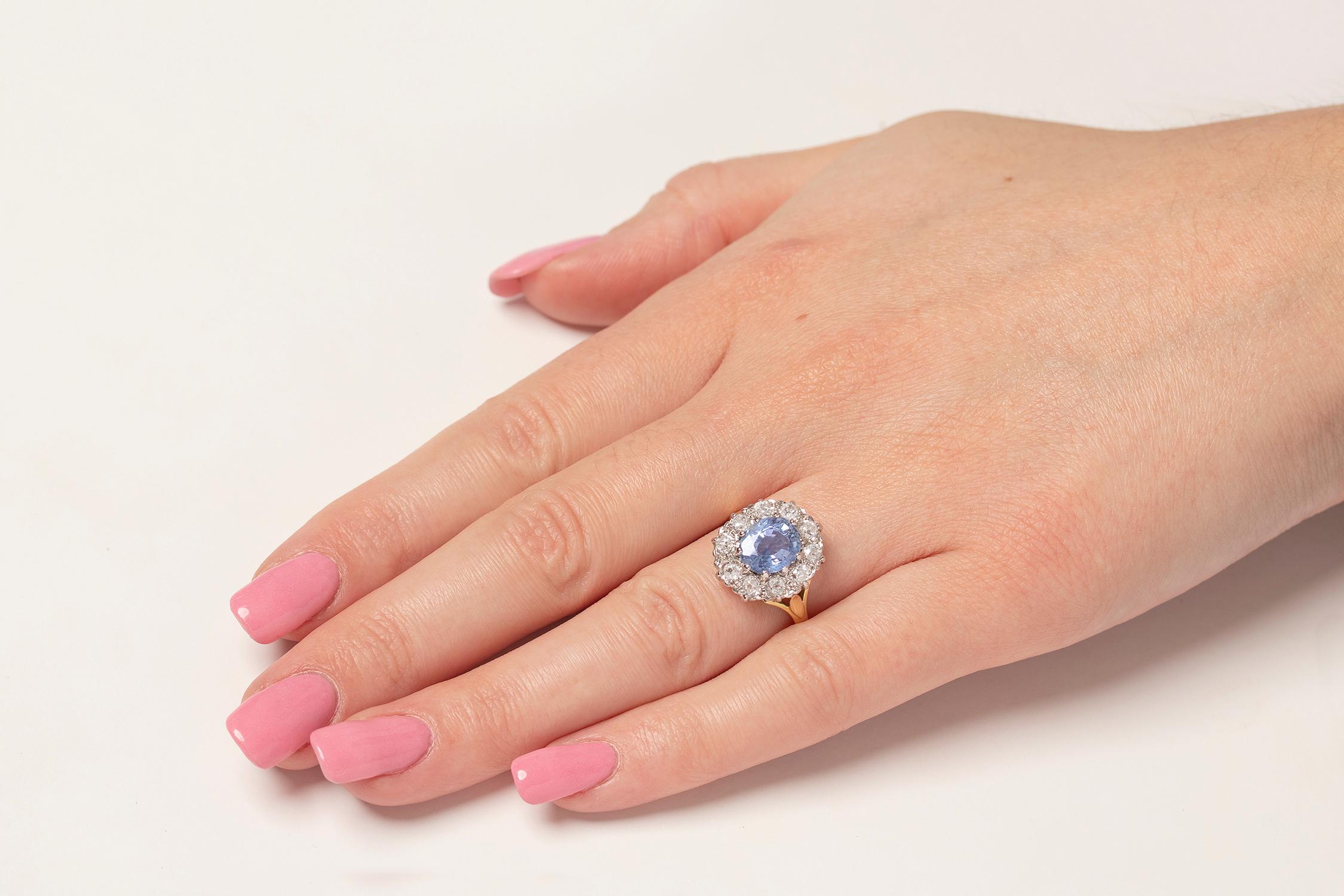 Oval Cut Vintage Sapphire and Diamond Cluster Ring, circa 1950s