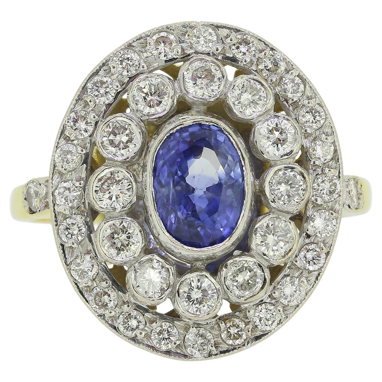 Anillo vintage de zafiro y diamantes en racimo