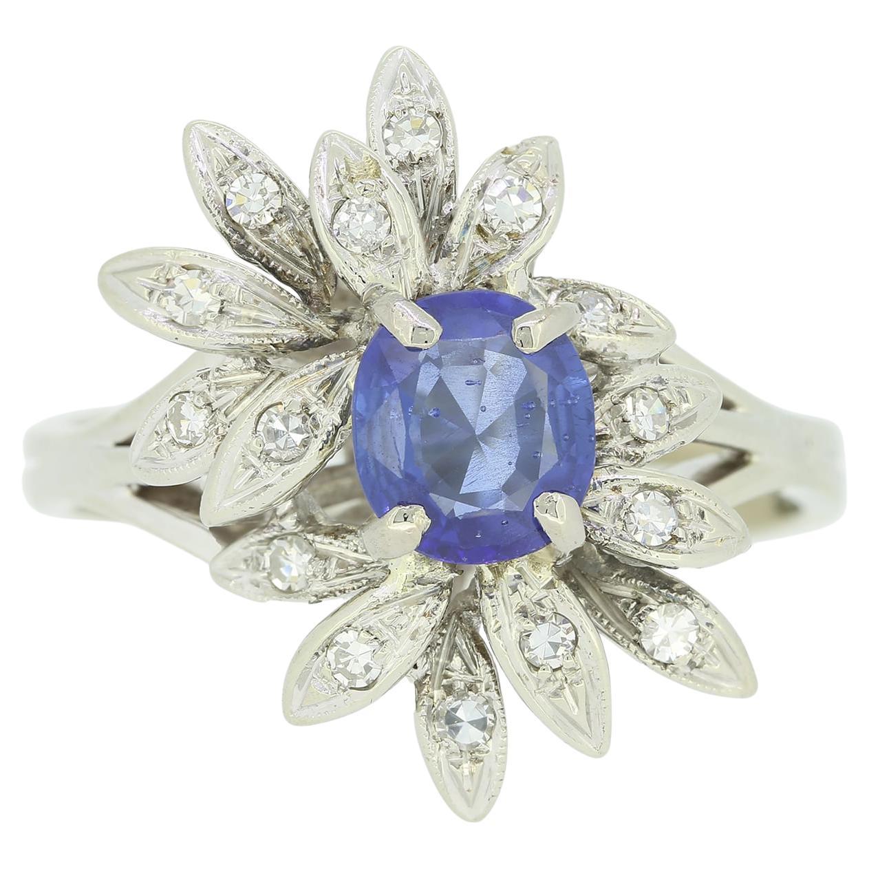 Anillo vintage de zafiro y diamantes en racimo