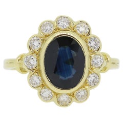 Vintage Cluster-Ring mit Saphiren und Diamanten