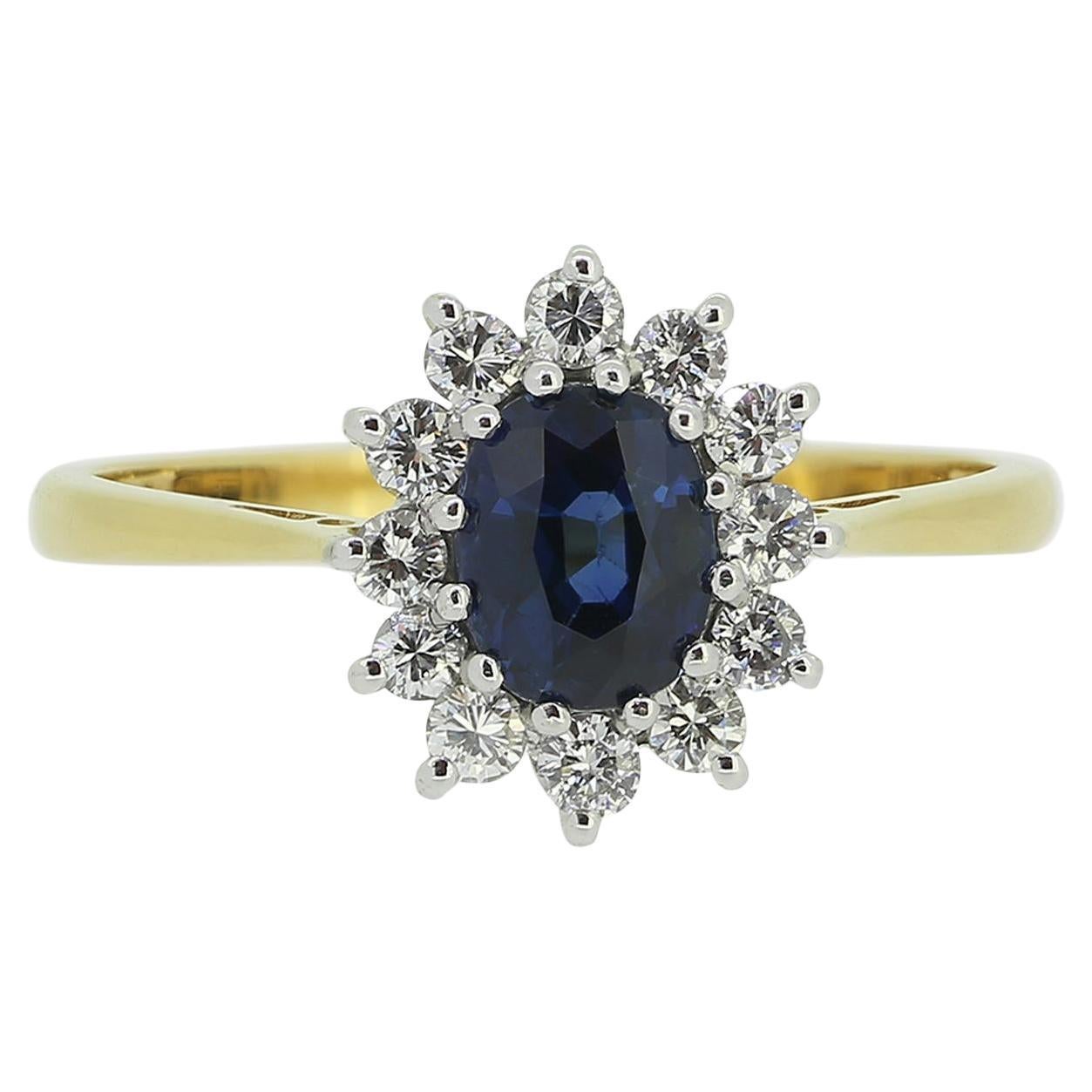 Anillo vintage de zafiro y diamantes en racimo