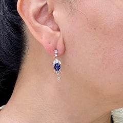 Orecchini pendenti vintage con zaffiri e diamanti in platino