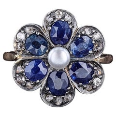 Anello a fiore con zaffiro e diamante d'epoca in argento e oro 15 ct.