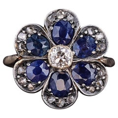 Vintage Sapphire and Diamond Flower Ring of Silver Topped 15ct Gold Vintage Sapphire and Diamond Flower Ring of Silver Topped 15ct Gold