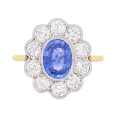 Bague halo vintage en saphir et diamants, c. 1960