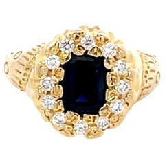 Vintage Sapphire and Diamond Halo Ring in 14k Yellow Gold