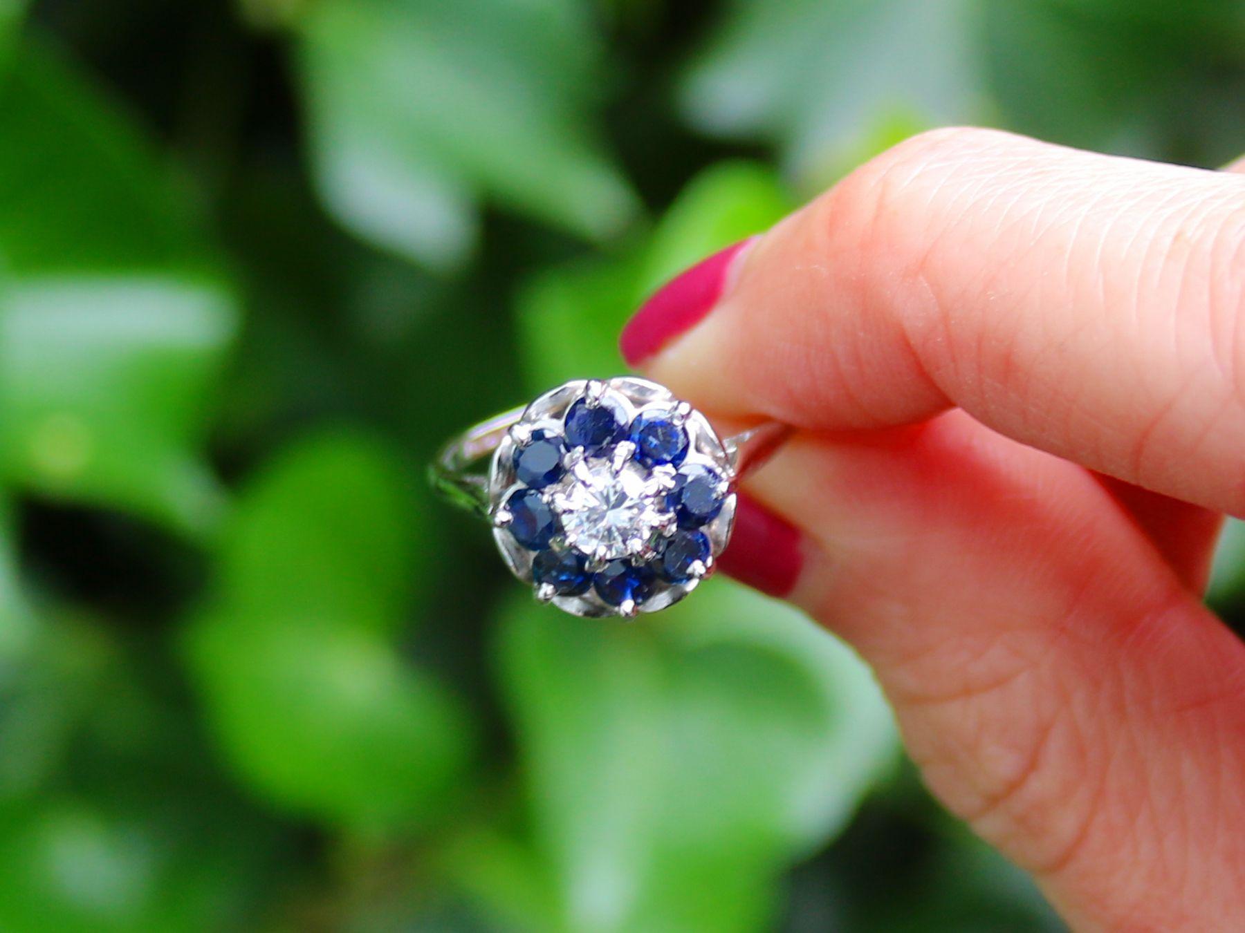 A fine and impressive vintage 1970s 0.64 carat sapphire and 0.41 carat diamond 18 karat white gold cluster ring; part of our diverse vintage jewelry/estate jewelry collections

This fine and impressive 1970s sapphire and diamond cluster ring has