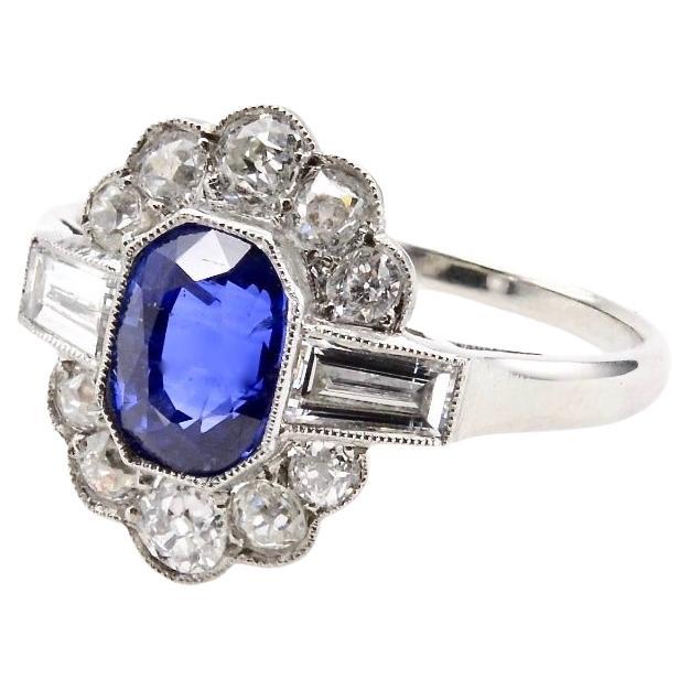 Vintage sapphire and diamonds ring in platinum For Sale