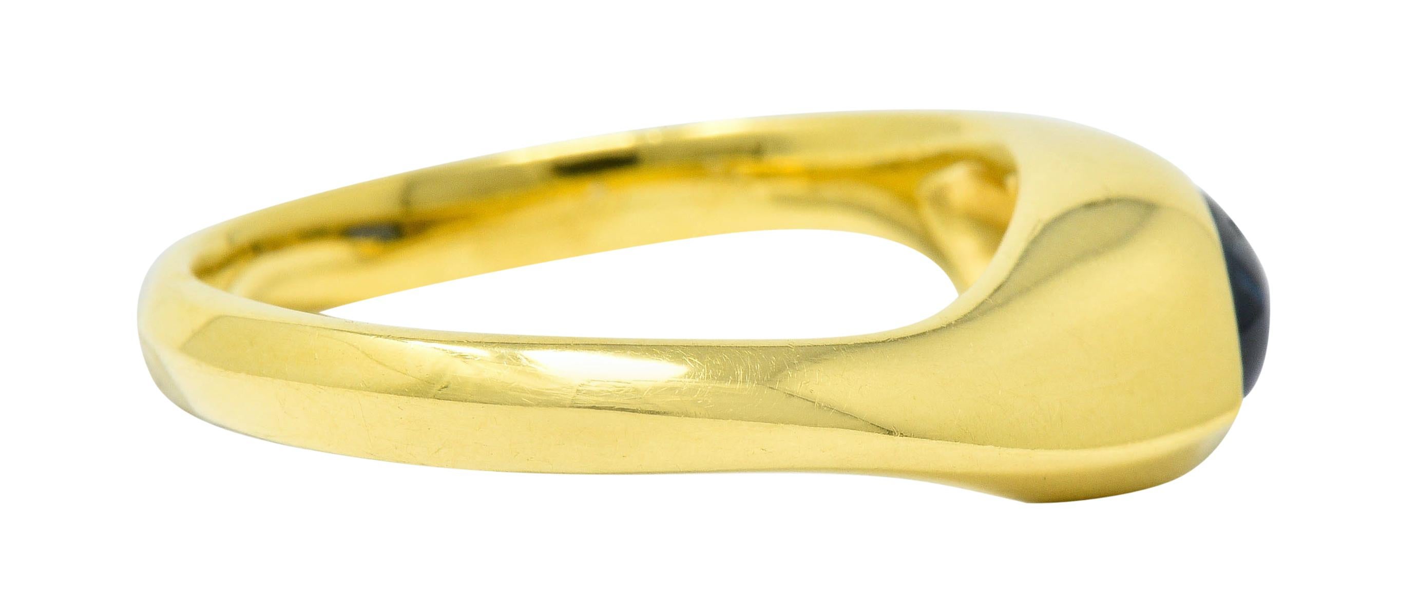 Contemporary Vintage Sapphire Cabochon 18 Karat Gold Eyelet Band Ring, circa 1990s