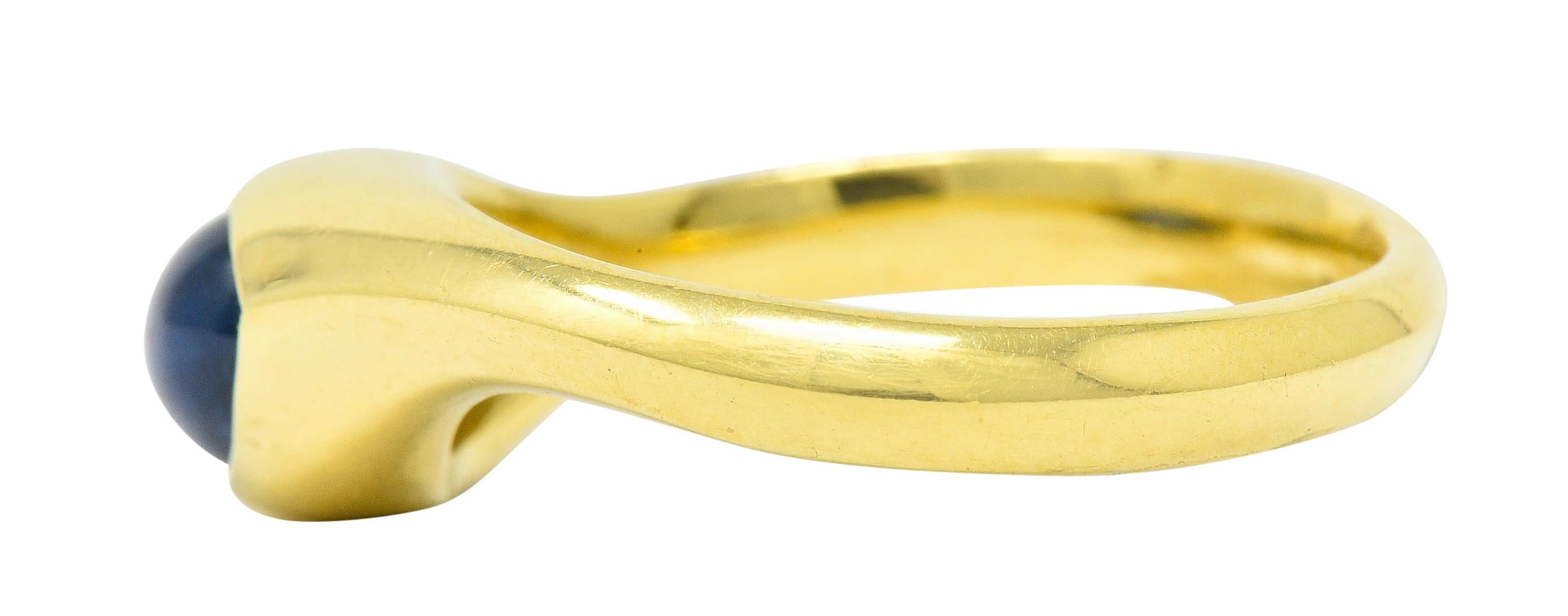 Women's or Men's Vintage Sapphire Cabochon 18 Karat Gold Eyelet Band Ring, circa 1990s