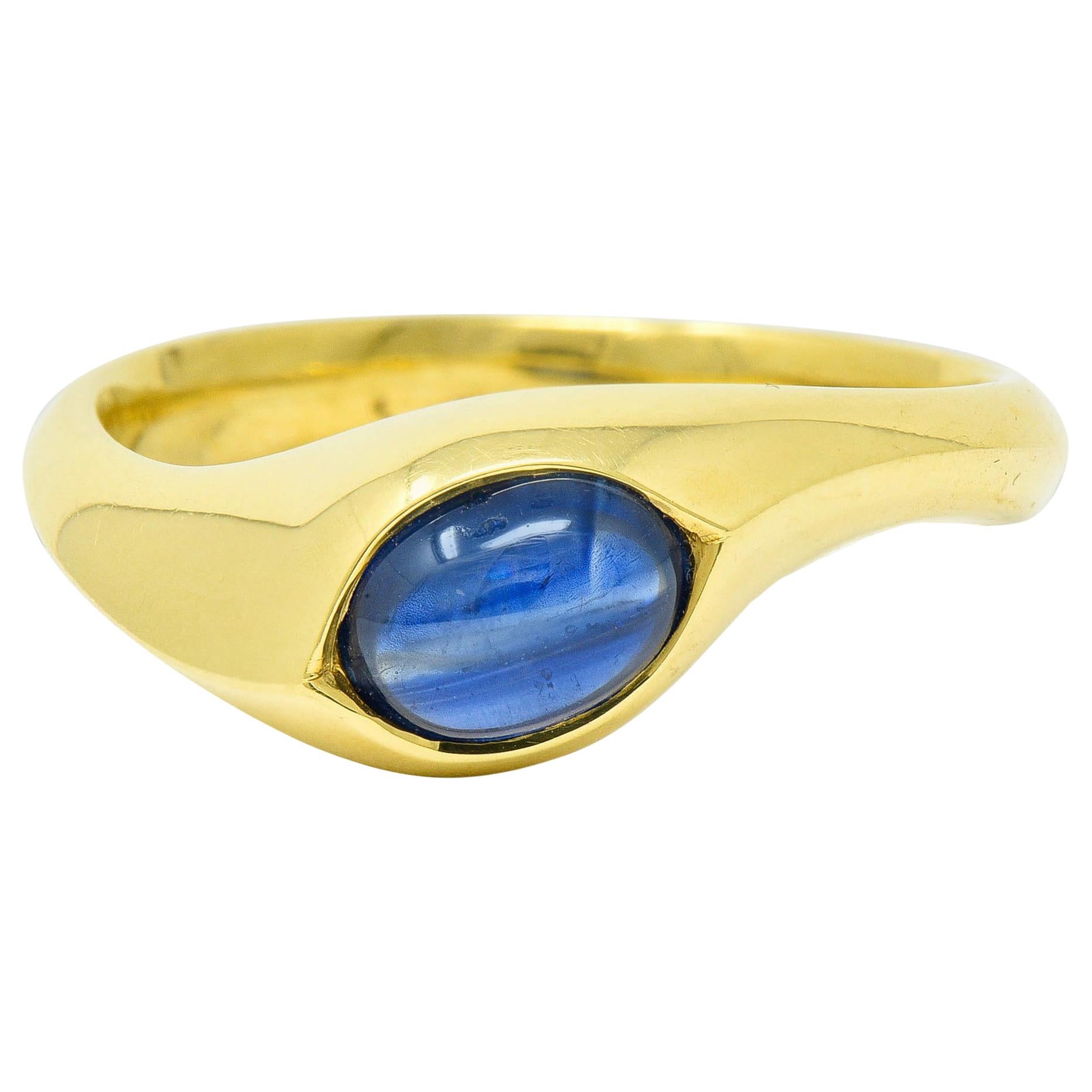 Vintage Sapphire Cabochon 18 Karat Gold Eyelet Band Ring, circa 1990s