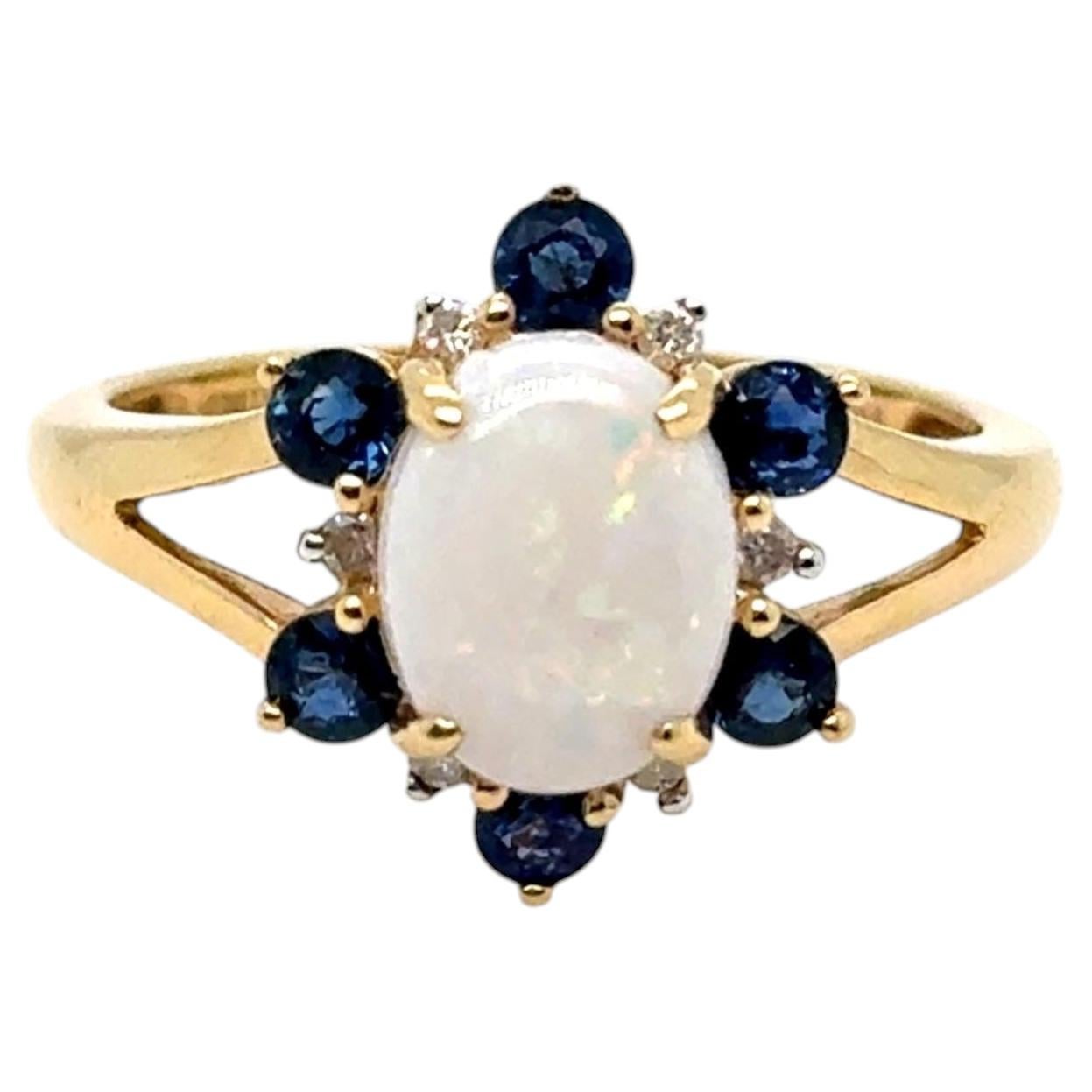 Vintage Sapphire, Diamond and Opal Ring in 14K Yellow Gold.