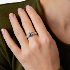 Vintage sapphire diamond bezel set platinum ring