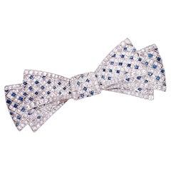 Vintage Sapphire & Diamond Bow Pin in Platinum