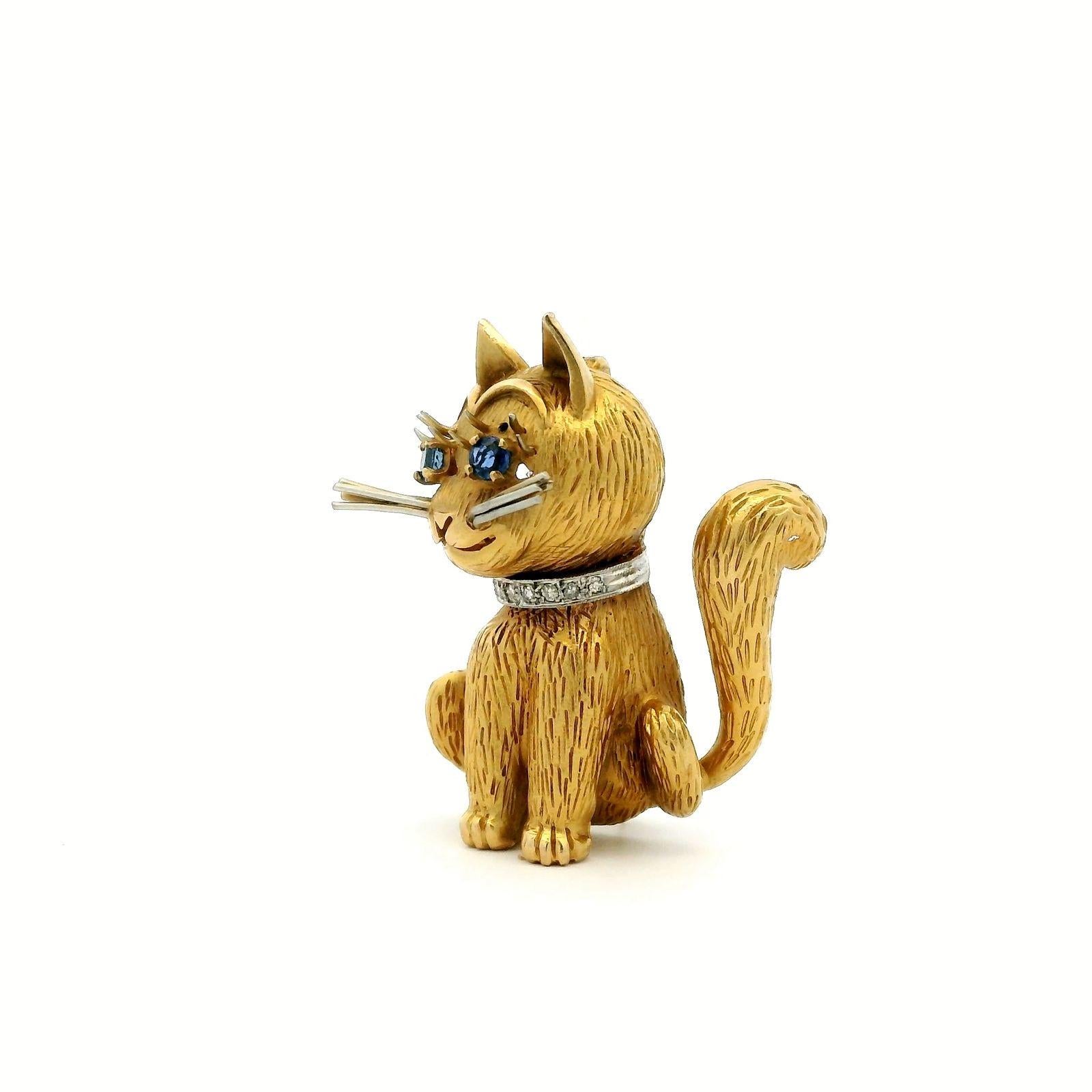 A vintage sapphire and diamond set cat brooch in 18 karat yellow gold and platinum, circa 1960

This charming stylized cat pin brooch is beautifully made. 

The strands of his fur are highly detailed and he features round sapphire set eyes
Wearing a