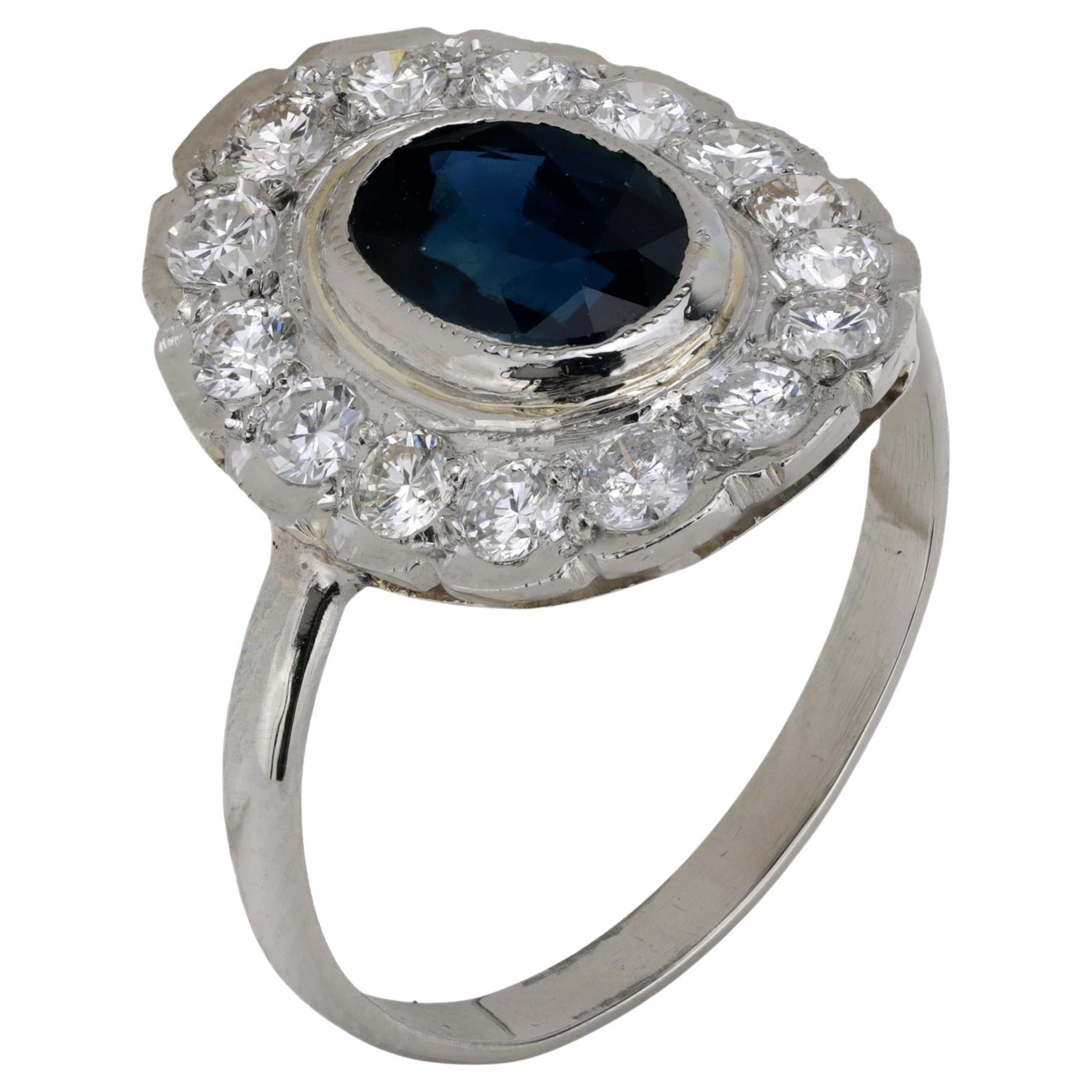 Vintage sapphire diamond platinum cluster ring