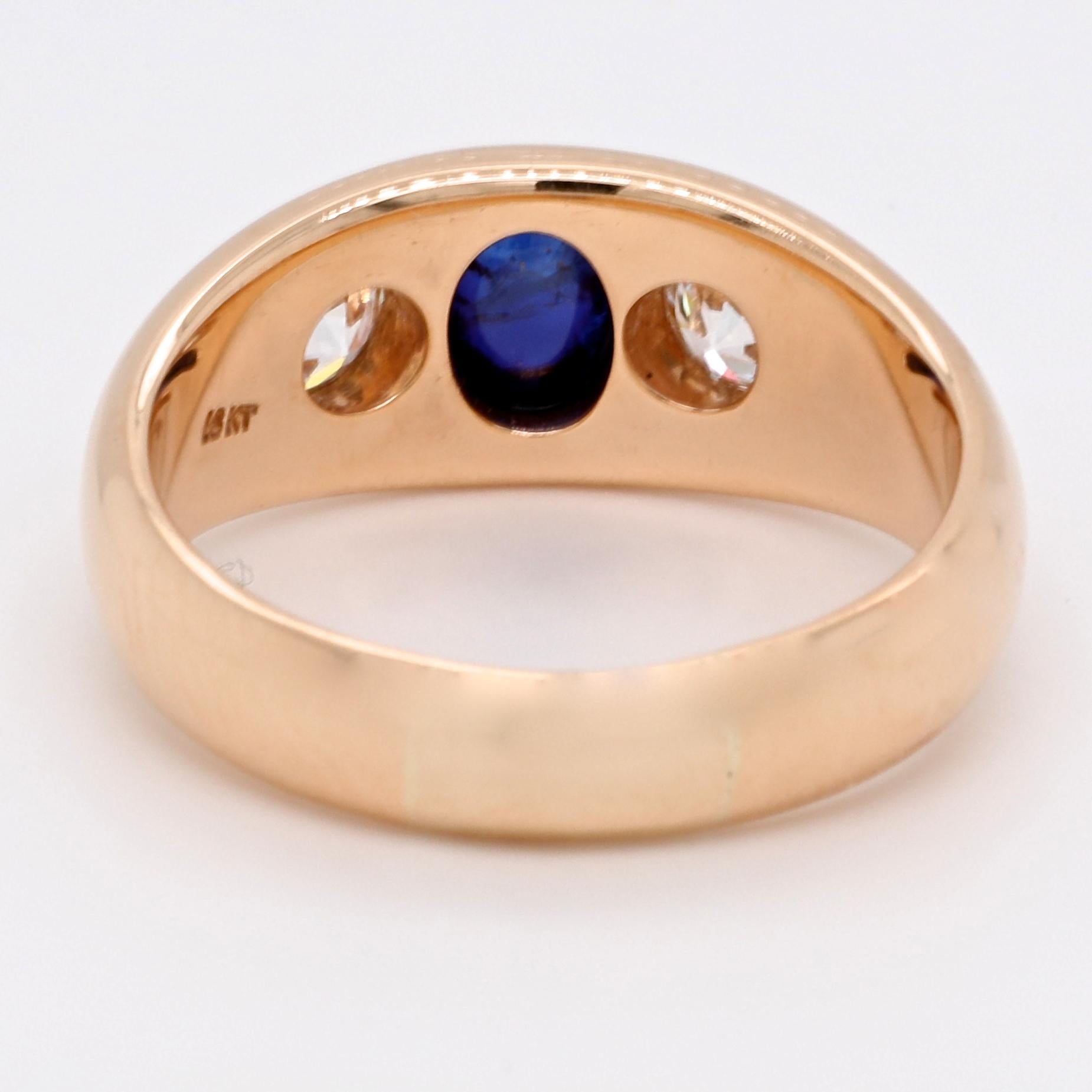 Classic, confident and bold, this gypsy ring is a must-have for any collection. Get yourself this desirable look that everyone is on the hunt for. This is a Vintage Sapphire Diamond Three Stone 18k Gold Gypsy Ring. The Sugarloaf cabochon sapphire is