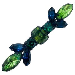 Vintage sapphire emerald rhinestones black metal designer brooch