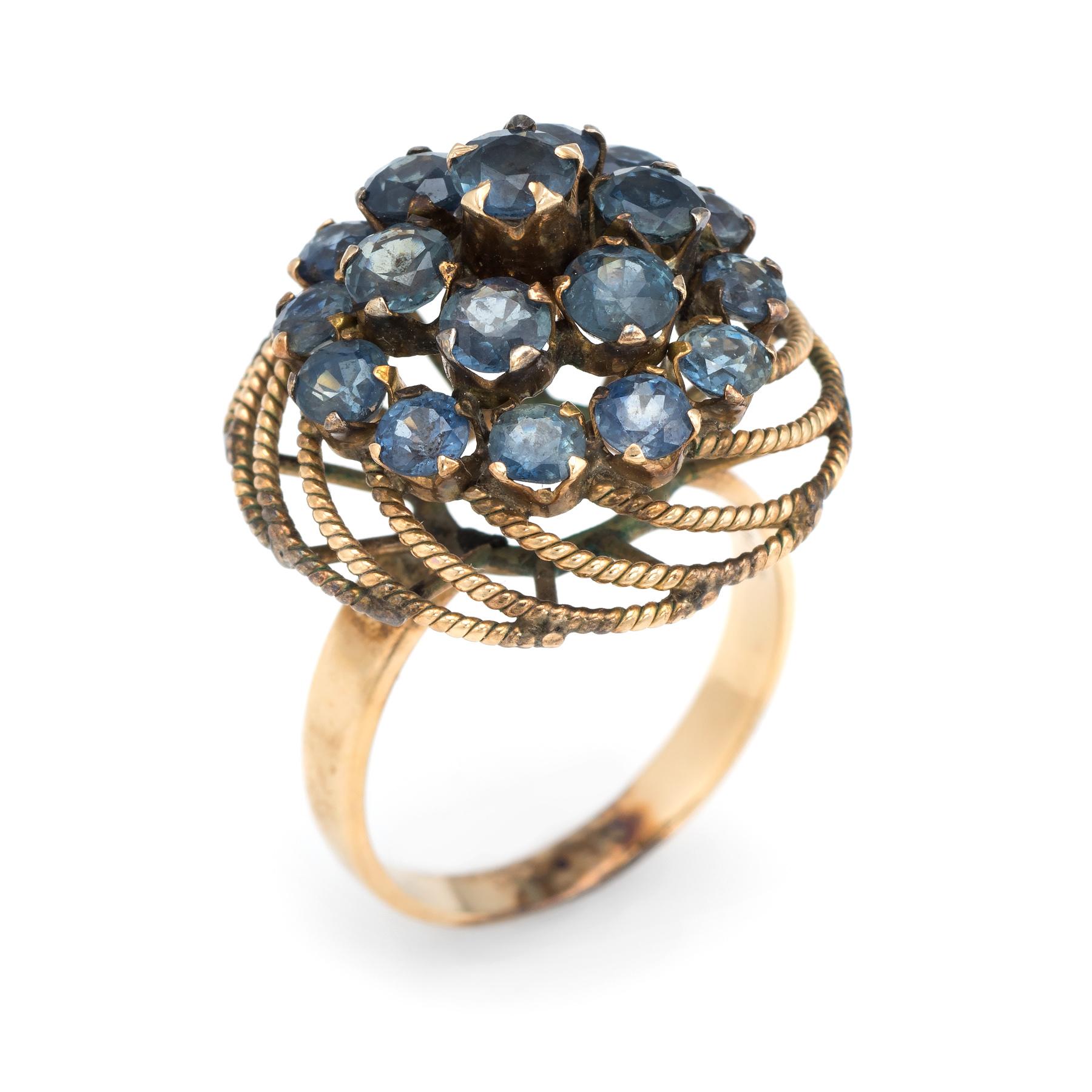 Finely detailed vintage harem cocktail ring (circa 1960s to 1970s), crafted in 14 karat yellow gold. 

18 faceted round cut blue sapphires measure 3.5mm each (average), estimated at 0.15 carats each. The total sapphire weight is estimated at 2.70