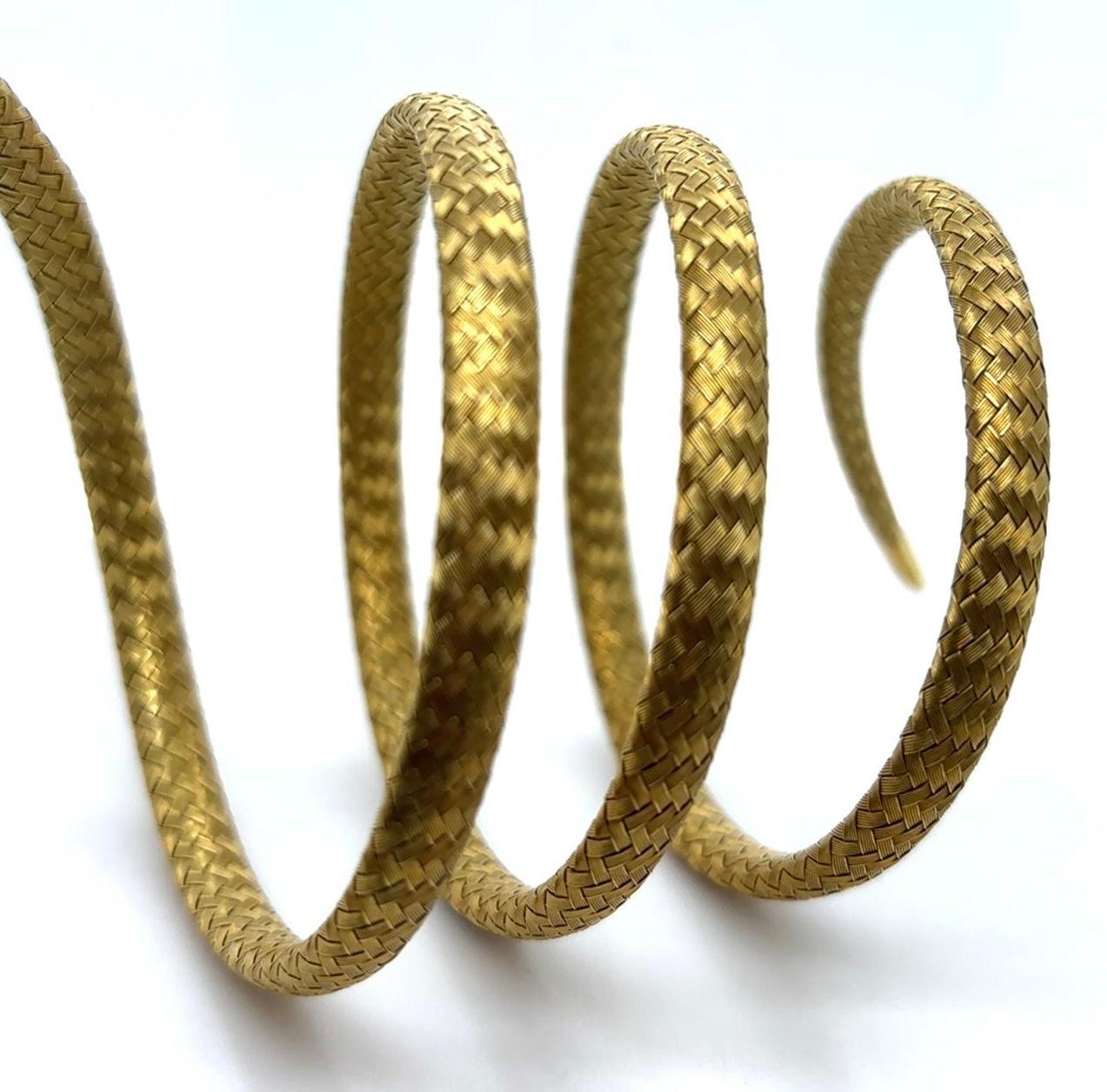 Vintage Sapphire Ruby 18 Karat Yellow Gold Snake Triple Coil Flexible Bracelet For Sale 1