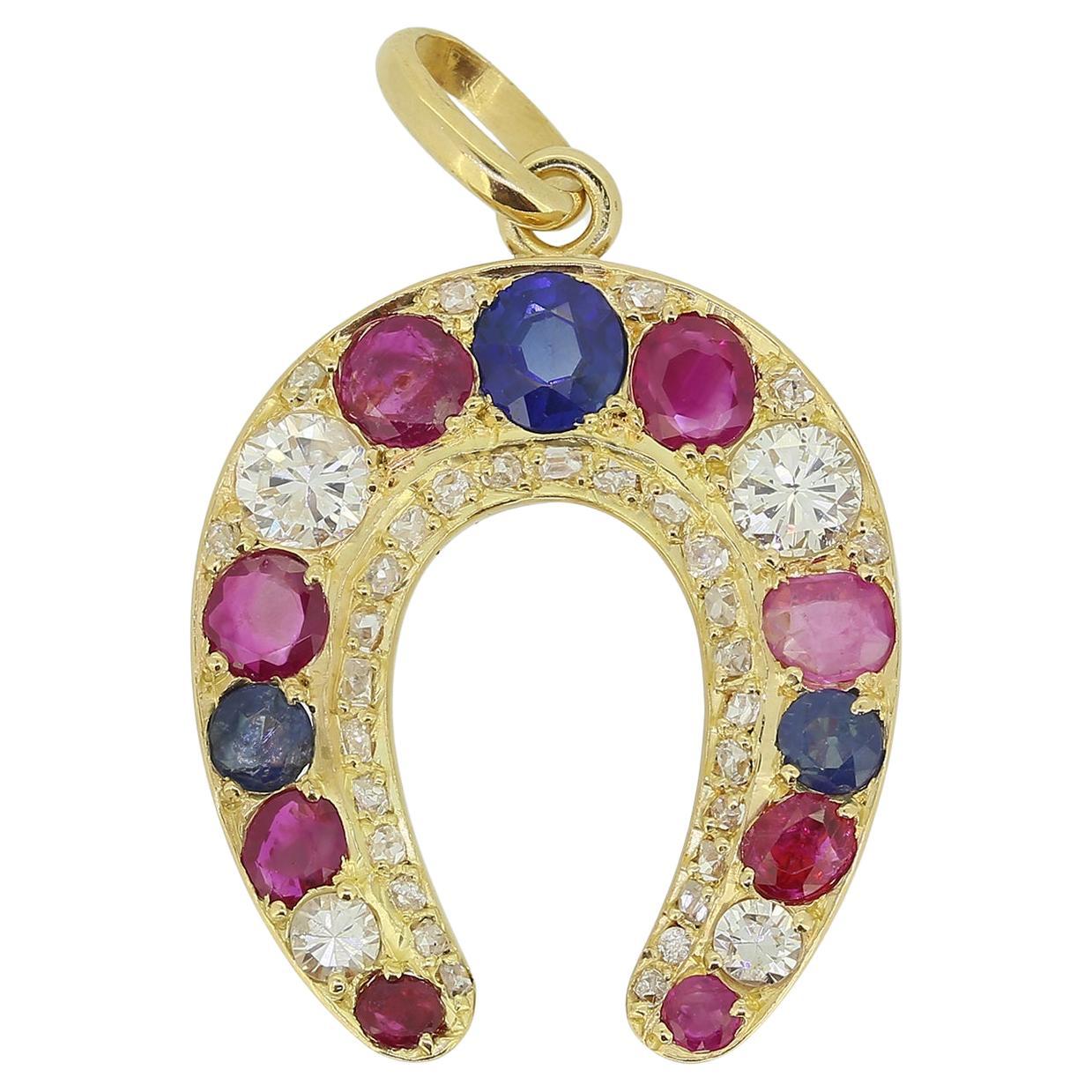Vintage Sapphire Ruby and Diamond Horseshoe Pendant For Sale