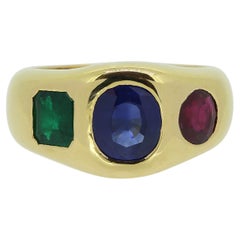 Bague vintage à trois pierres saphir, rubis et émeraude