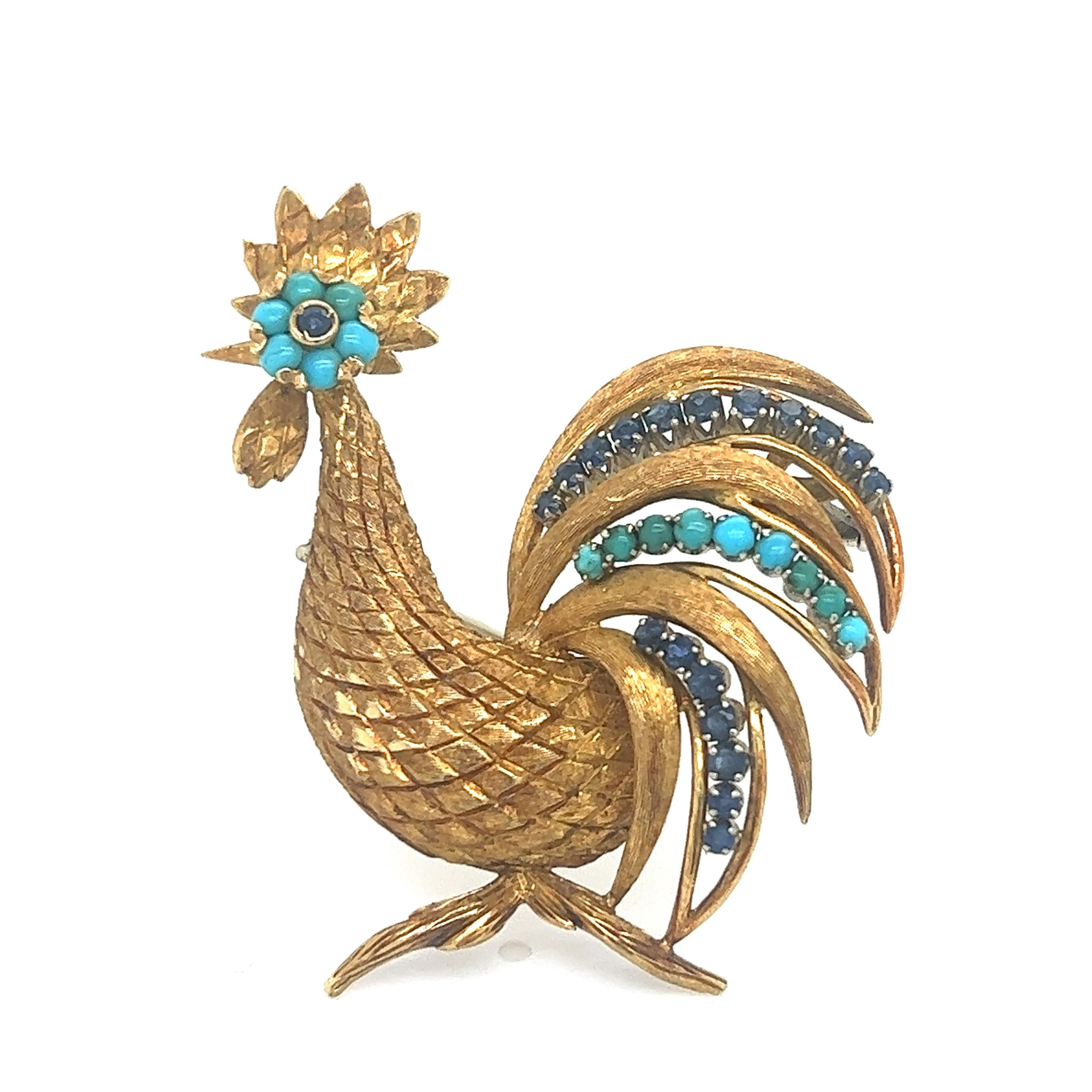 Beautiful brooch crafted in 18k yellow gold. The brooch depicts a rooster with fine details seen throughout. Multiple polish textures makes this item feel almost lifelike.
The brooch is highlighted with earth mined natural turquoise and blue