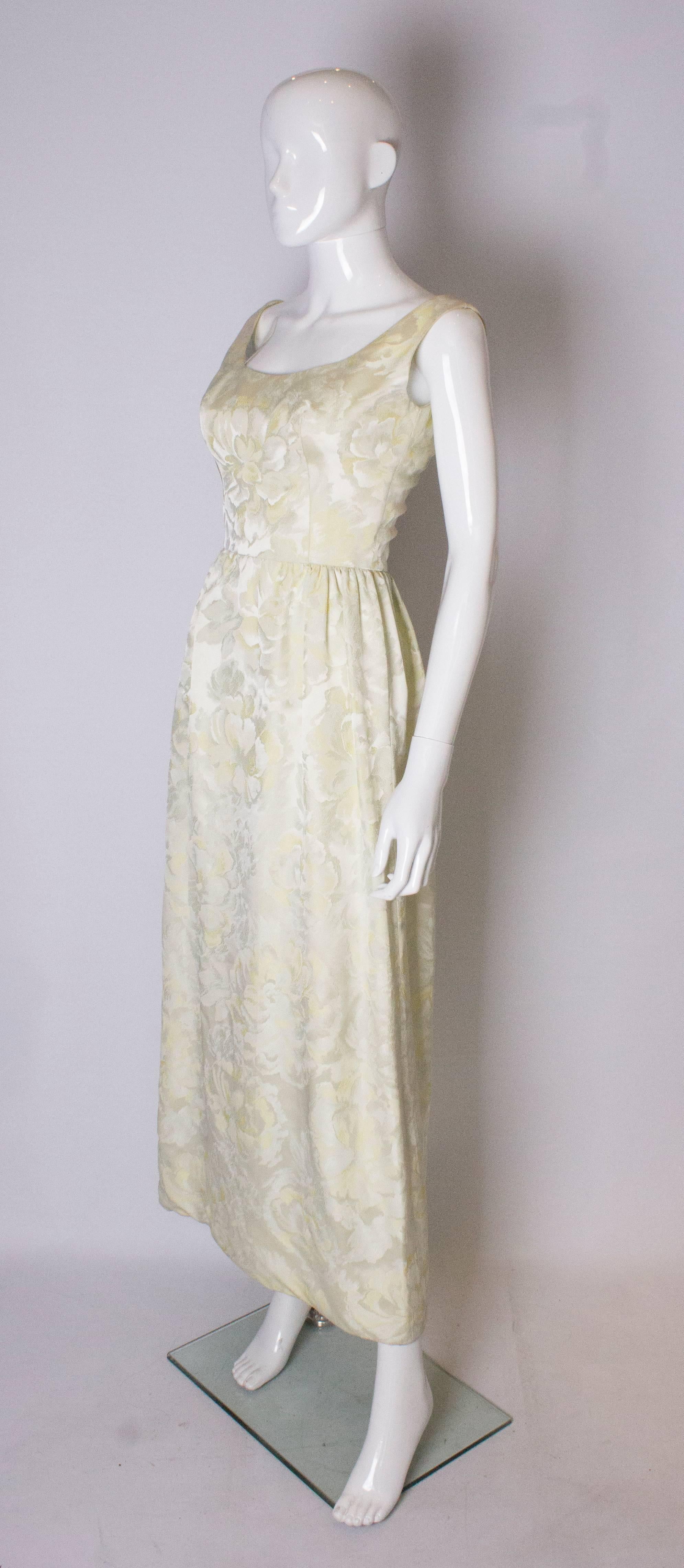 Beige A vintage 1960s yellow floral brocade dress by Sarmi 