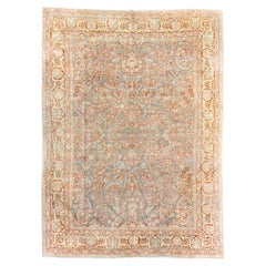 Vintage Sarouk Carpet with Floral Sprays Surrounding a Rosette Center