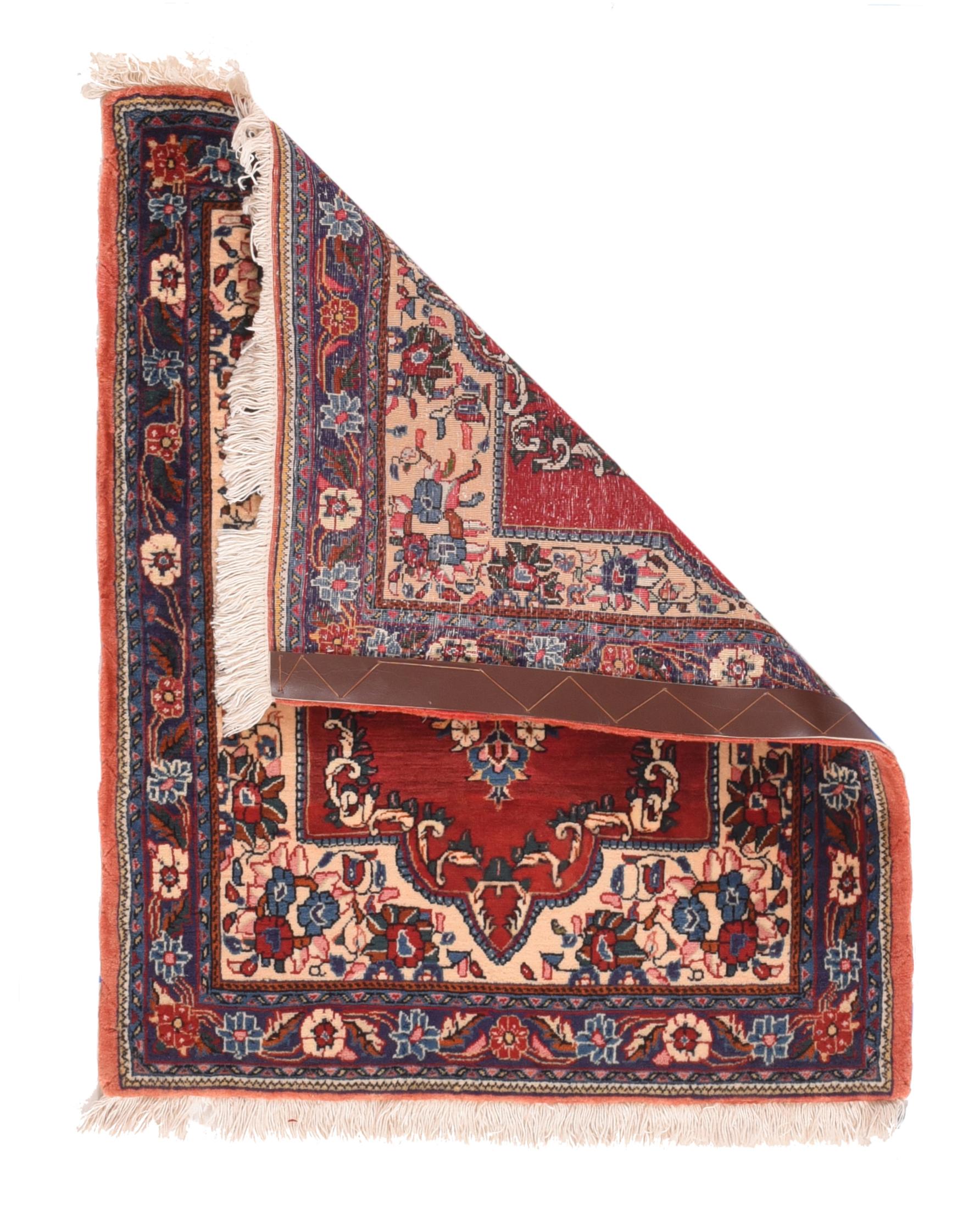 Vintage Sarouk rug¬†2'2'' x 2'9''. This finely woven urban ruglet shows a creamy sand field with various rosette modules, framing the lipstick red central octogramme subfield with an acanthus wreath around a cerulean blue medallion sprouting