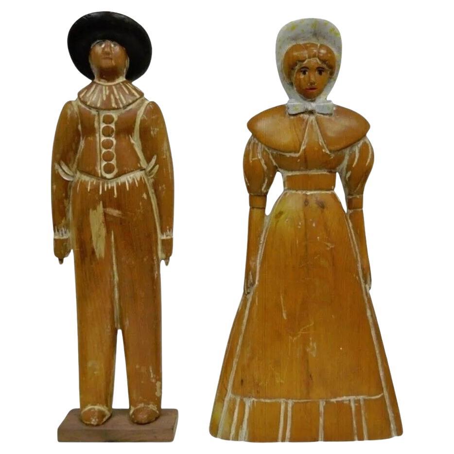 Vintage Sarreid Ltd Pine Wooden Folk Art Sculptures Man and Woman 22" Tall Pair For Sale