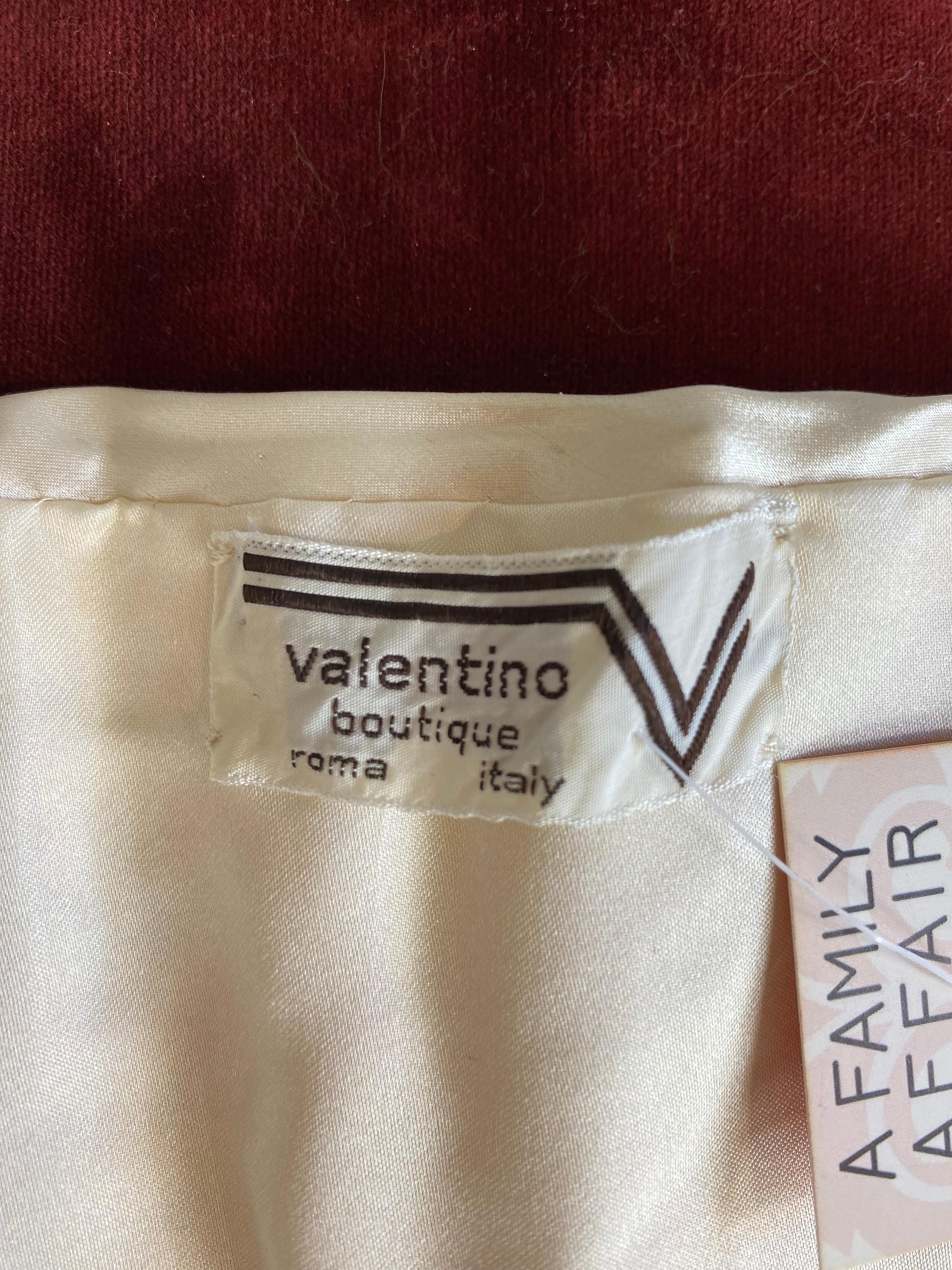 Beige Vintage satin top by Valentino in ivory.