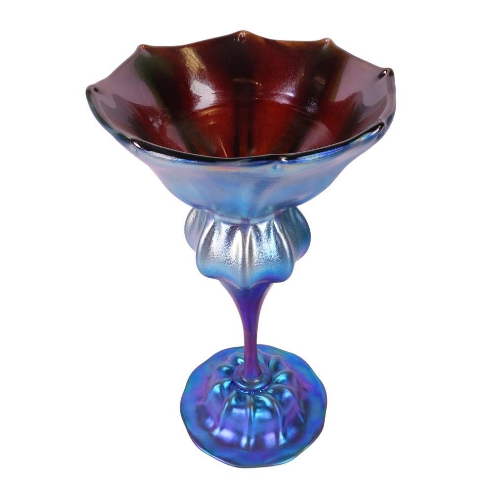 Vintage Saul Alcaraz art glass floriform corset vase made from hand-blown glass with a applied ribbed foot and body with pulled 