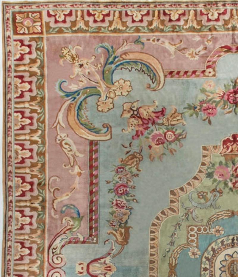 Vintage Savonnerie style rug handwoven in India, circa 1920. Savonnerie carpets have been produced since the 1600s. The name comes from the French word for soap, ‘savon’ as they were produced in an area where soap factories were based. The designs