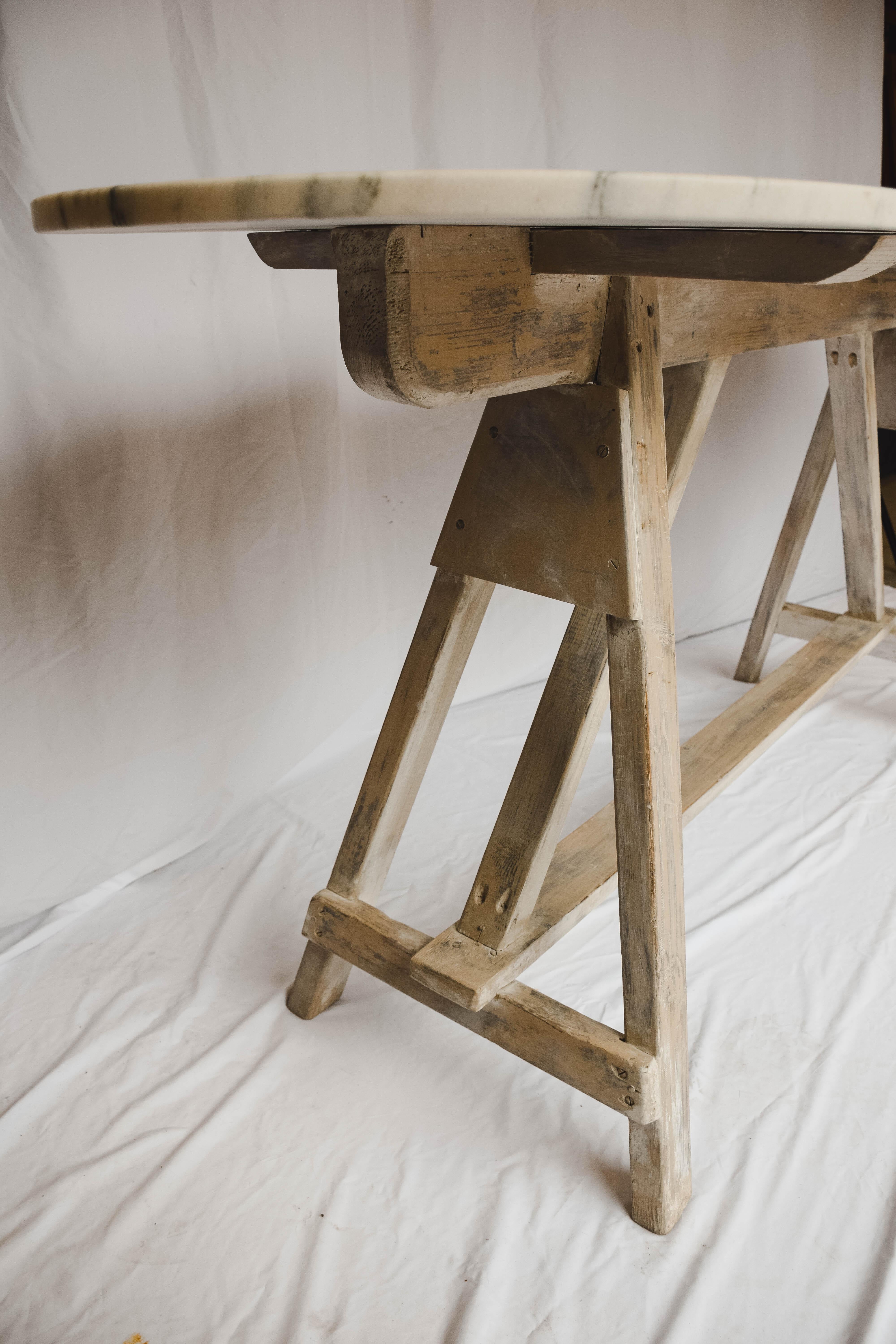 This vintage sawhorse table features a beautiful Vermont marble top. We love the size and simplicity of this piece. A perfect table to use as a console table in an entry or behind a sofa. We have two available.


 