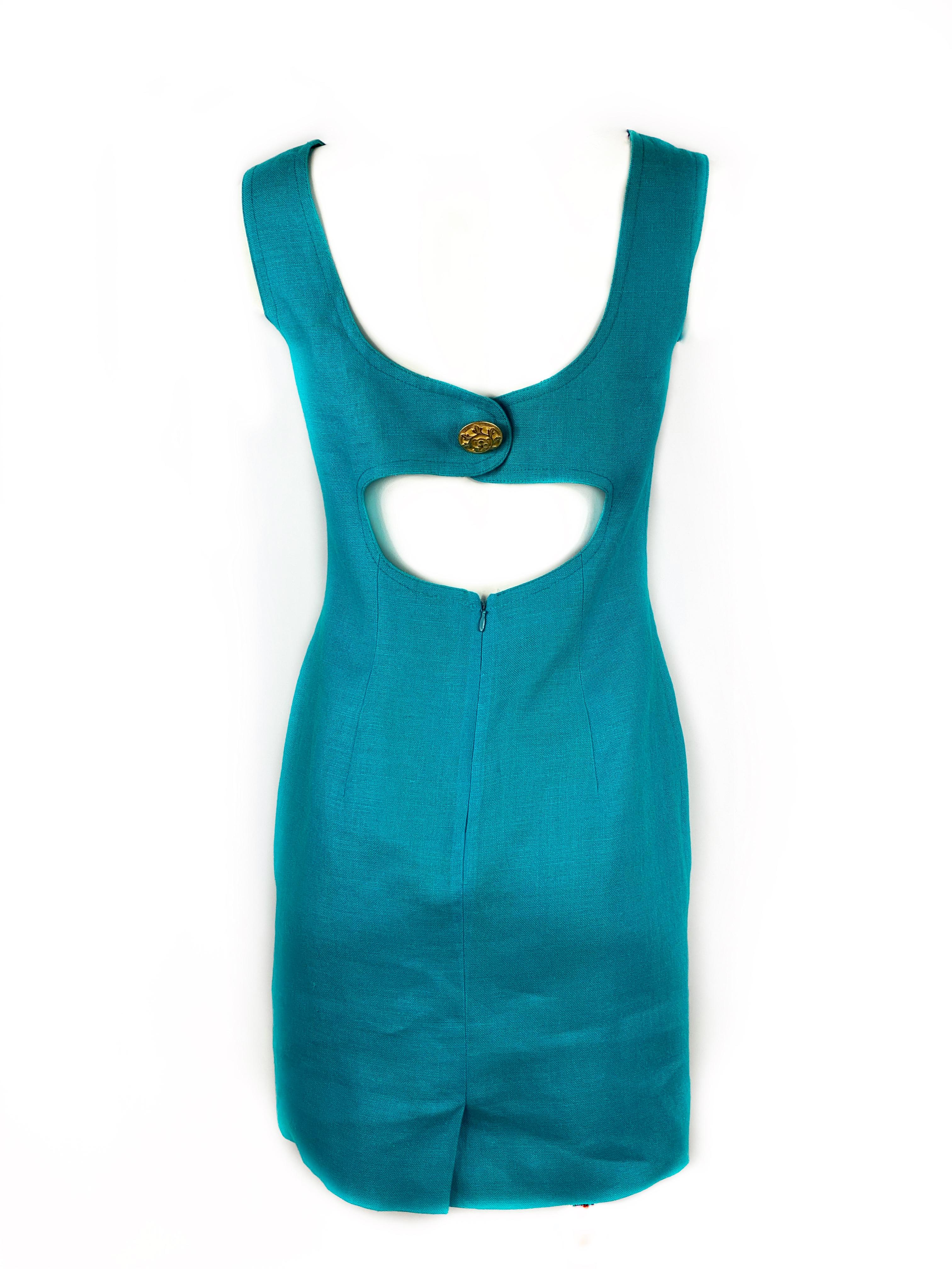 Scaasi Blue Turquoise Linen Sleeveless Mini Dress w/ Gold Buttons Size 4

Product details:
Size 4
Sleeveless 
Featuring open back detail
Gold tone button w/ leaves detail, two on the front and one on the back
Rear zip and button closure
Made in USA
