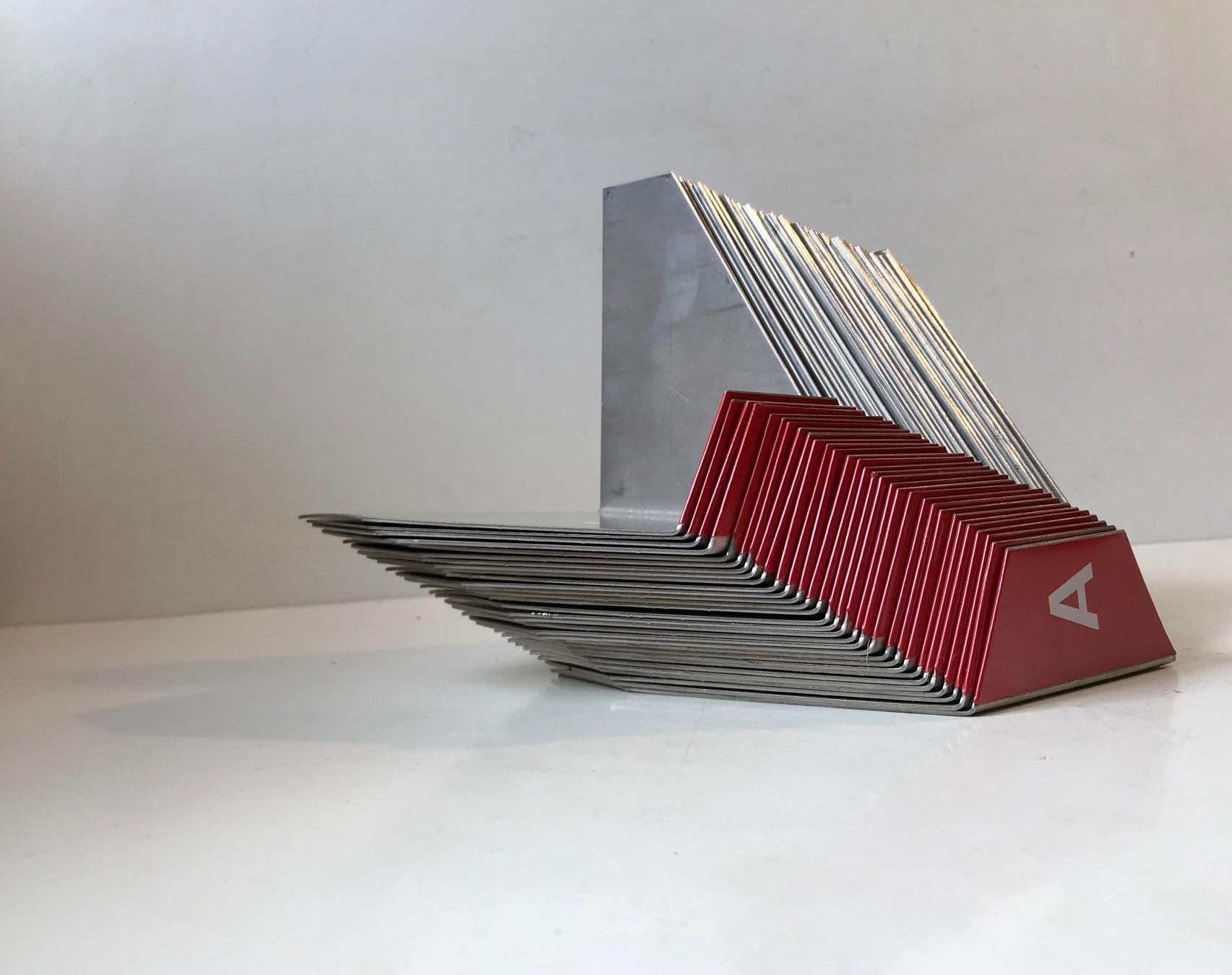 Custom made vintage alphabetical office bookends. A complete set from A-Z plus the Danish letters: æ, ø, å. 3o or 31 in total. They are made from stainless steel and has letters ion red foil. They were made in Scandinavia during the 1970s for a