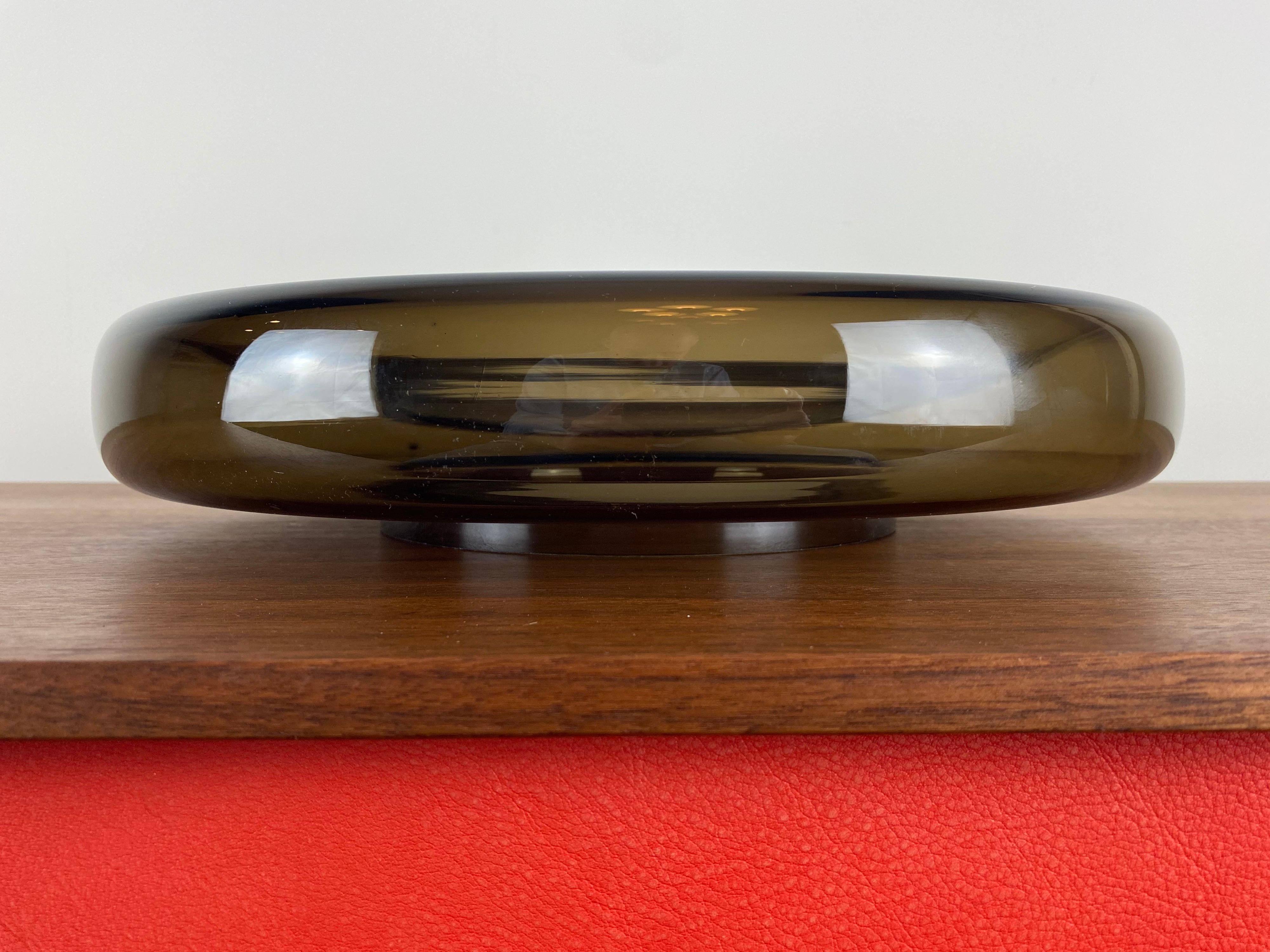 This is of unknown origin but similar to Charles Pfister for Knoll, dual-layer glass bowls. This piece has a sleek look with warm tinted glass and modern organic curves. Sure to make a great centerpiece and pair with Danish modern, or mid-century