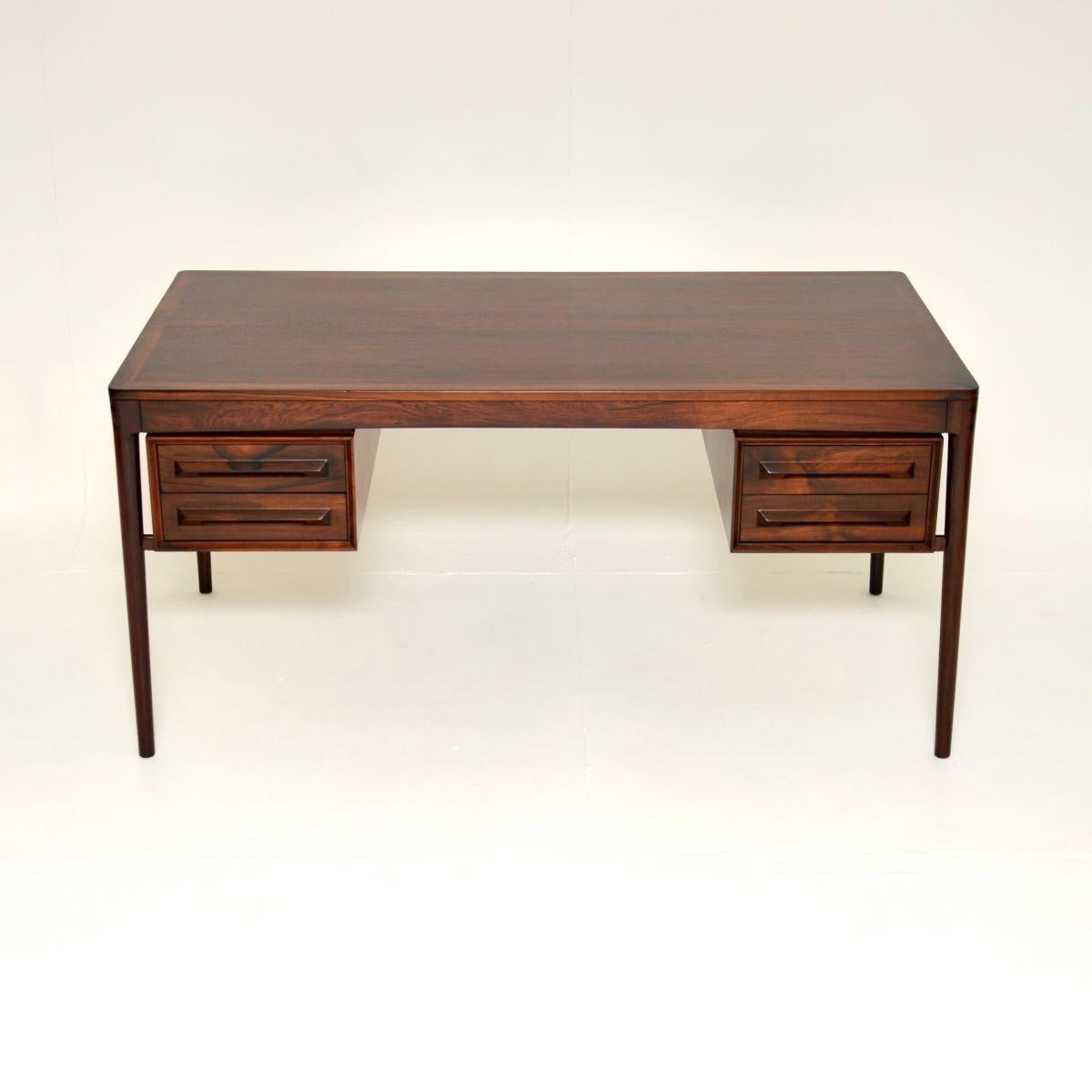 An exceptional vintage Scandinavian desk by Torbjorn Afdal. This was made by Bruksbo in Norway, it dates from the 1960’s.

The quality is outstanding, this has a beautiful and very useful design. The colour tones and grain patterns are stunning,