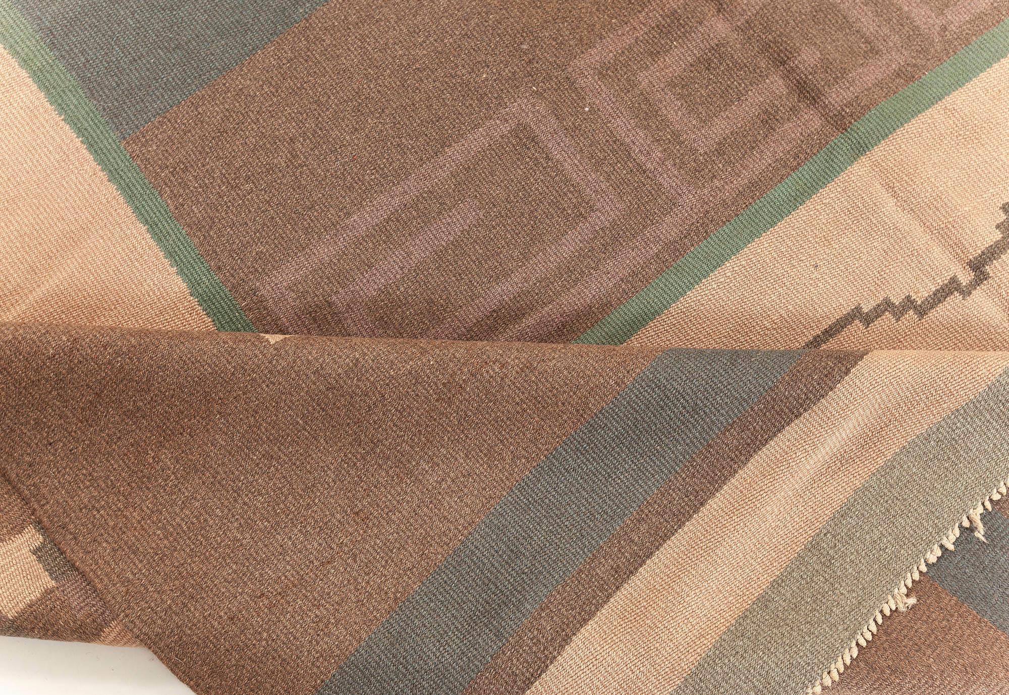 Vintage Scandinavian flat-weave wool rug. Woven initials and date to edge 'IO 1928'
Size: 7'9