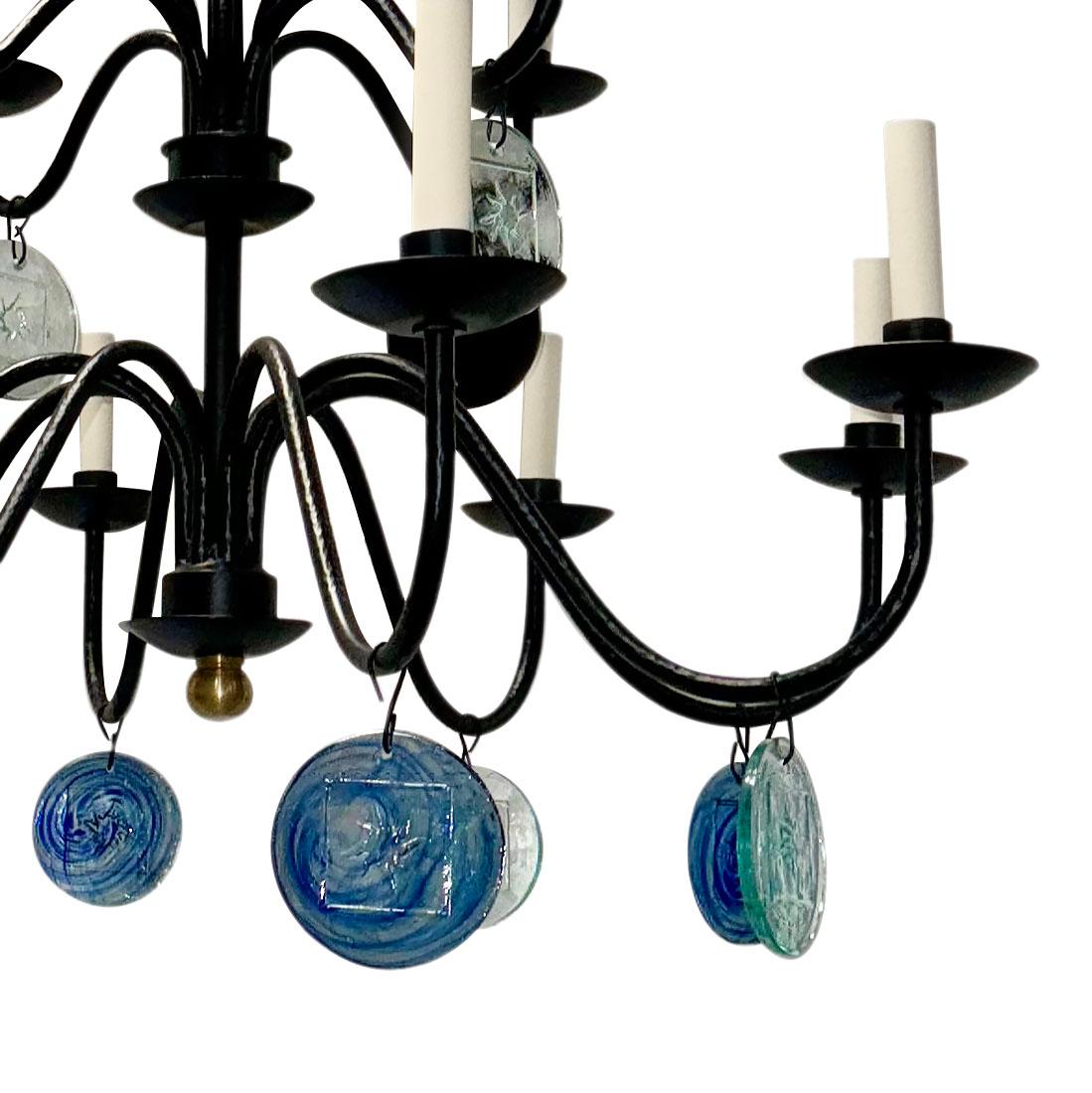 A circa 1970's Swedish iron chandelier with glass pendants and 16 lights.

Measurements:
Drop: 39