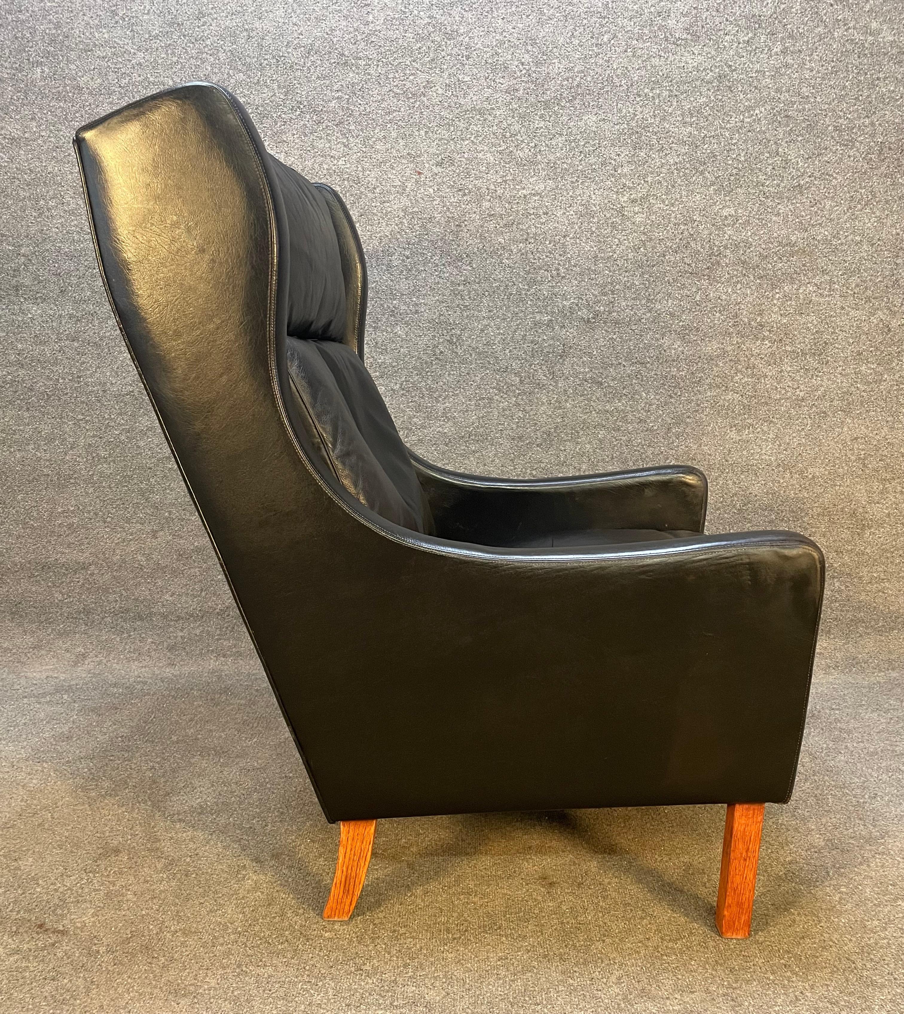 Here is a beautiful 1960's scandinavian modern easy chair in black leather attributed to famed Swedish designer Borge Mogensen.
This comfortable lounge chair, recently imported from Europe to California, features a well patined leather and four
