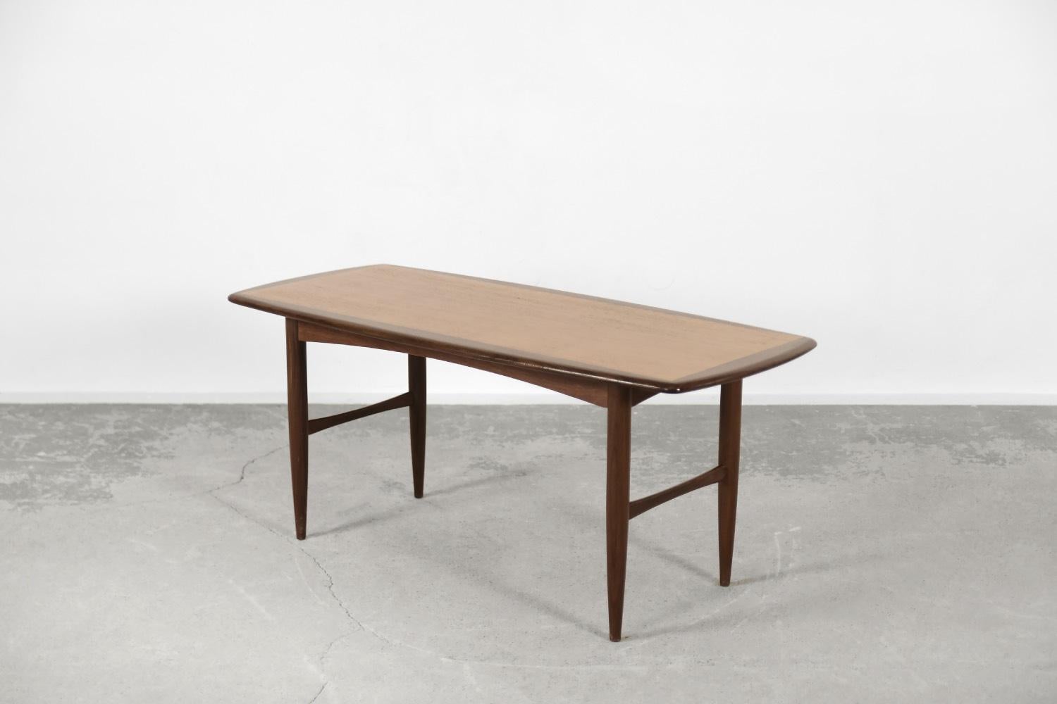 This coffee table was made by the Swedish manufacturer HMB Möbler, in Rörvik during the 1950s. It is made of high-quality teak wood, which is extremely resistant to external factors and owes its longevity mainly to a specific composition, rich in
